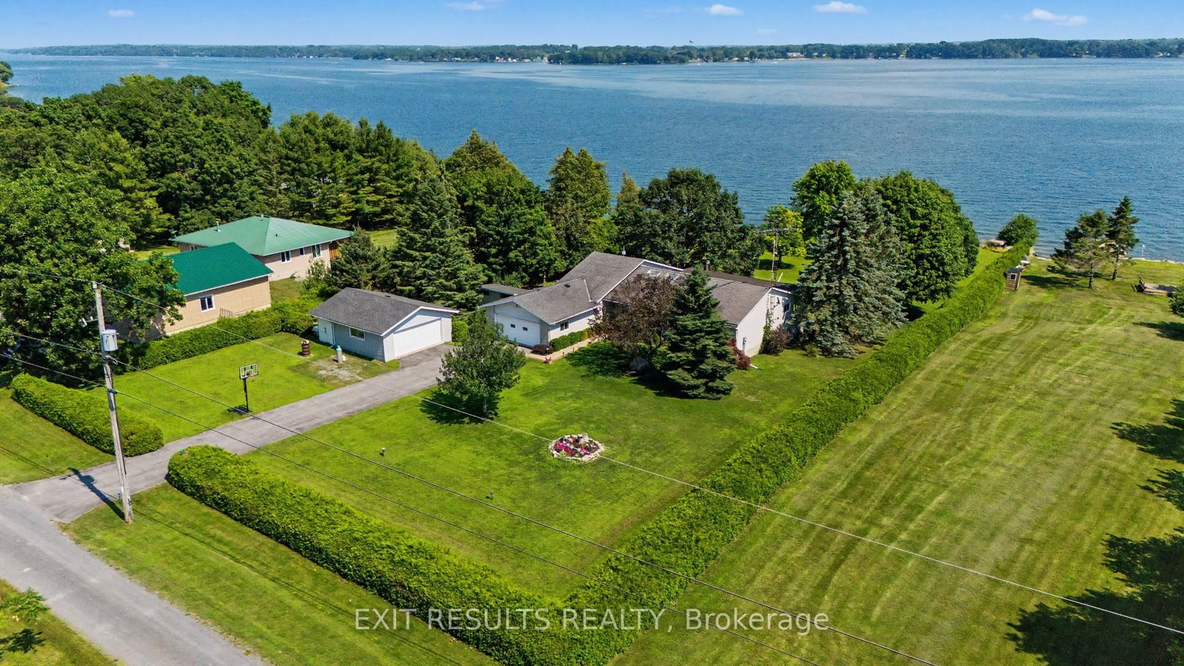 A pic from outside/outdoor area/front of a property/back of a property/a pic from drone, water/lake/river/ocean view for 51 Elizabeth St, Wolfe Island Ontario K0H 2Y0