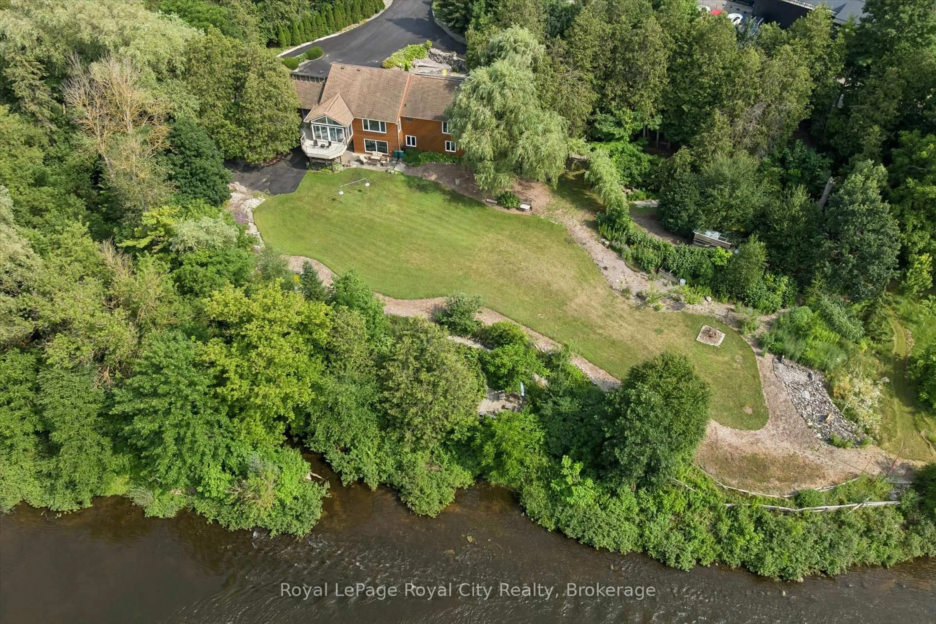 A pic from outside/outdoor area/front of a property/back of a property/a pic from drone, water/lake/river/ocean view for 8060 Wellington 18 Rd, Centre Wellington Ontario N1M 2W5