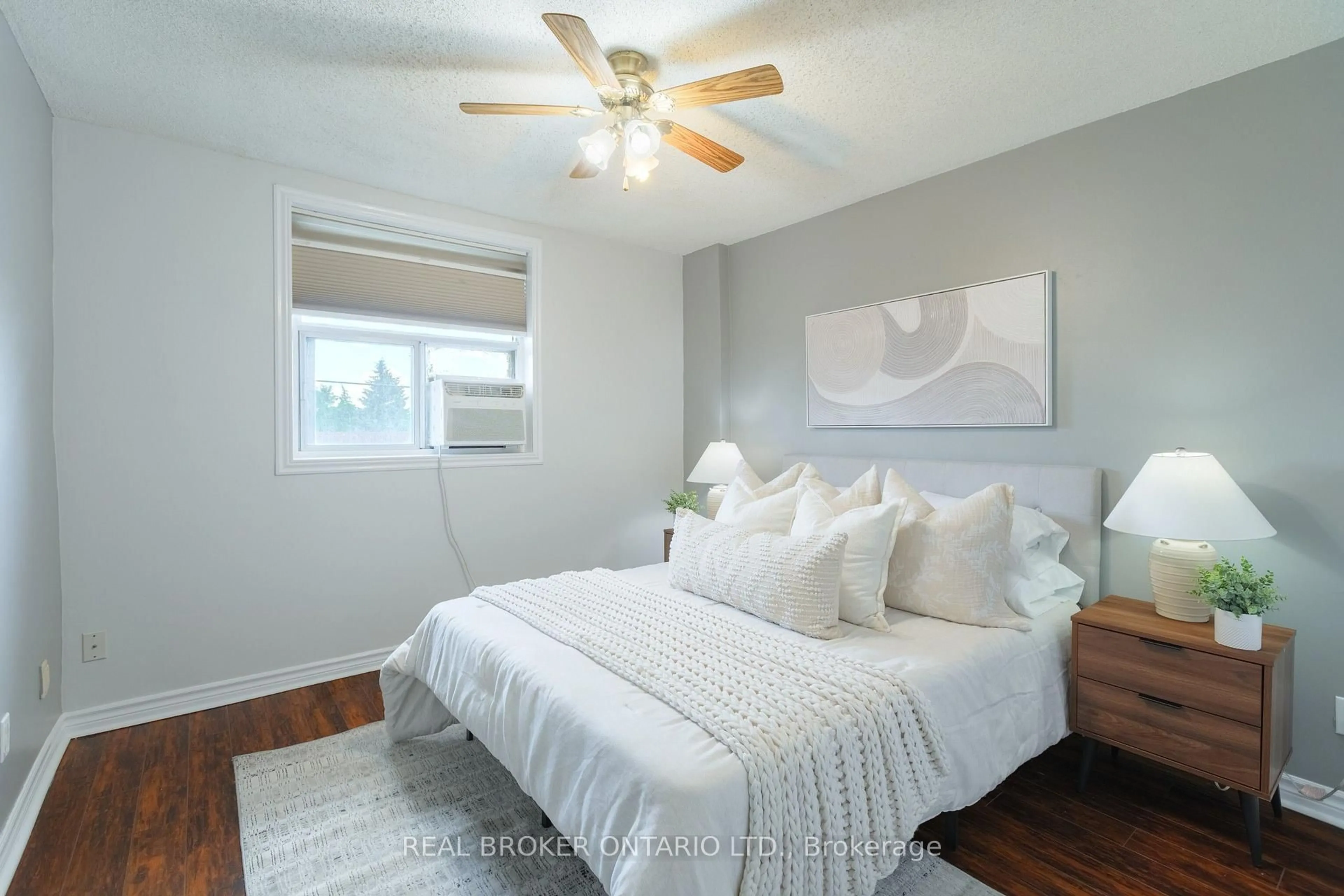 Bedroom with bed, wood/laminate floor for 893 Concession St #202, Hamilton Ontario L8V 1E7