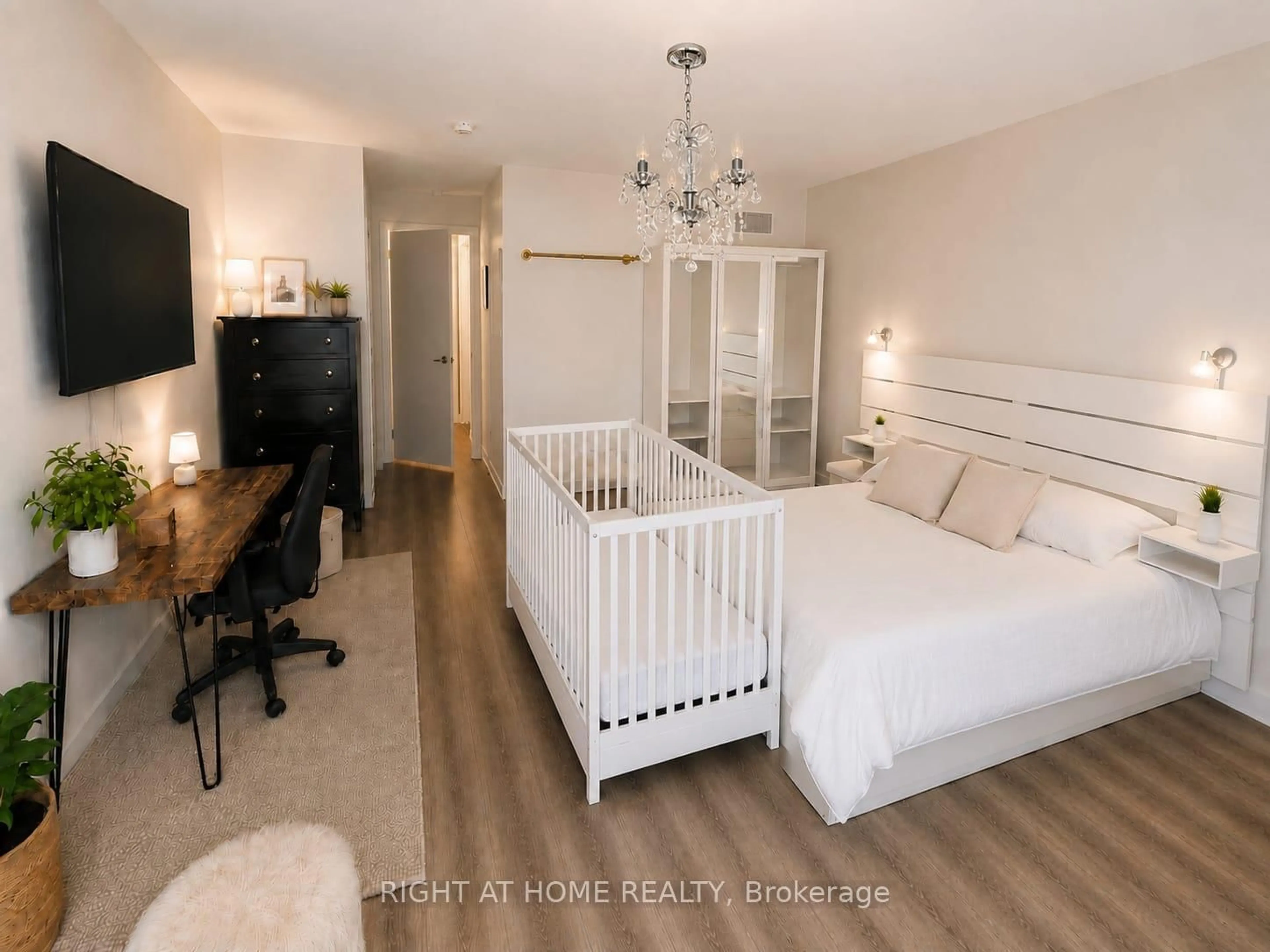 Bedroom with bed, wood/laminate floor for 590 North Service Rd #15, Hamilton Ontario L8E 0K5