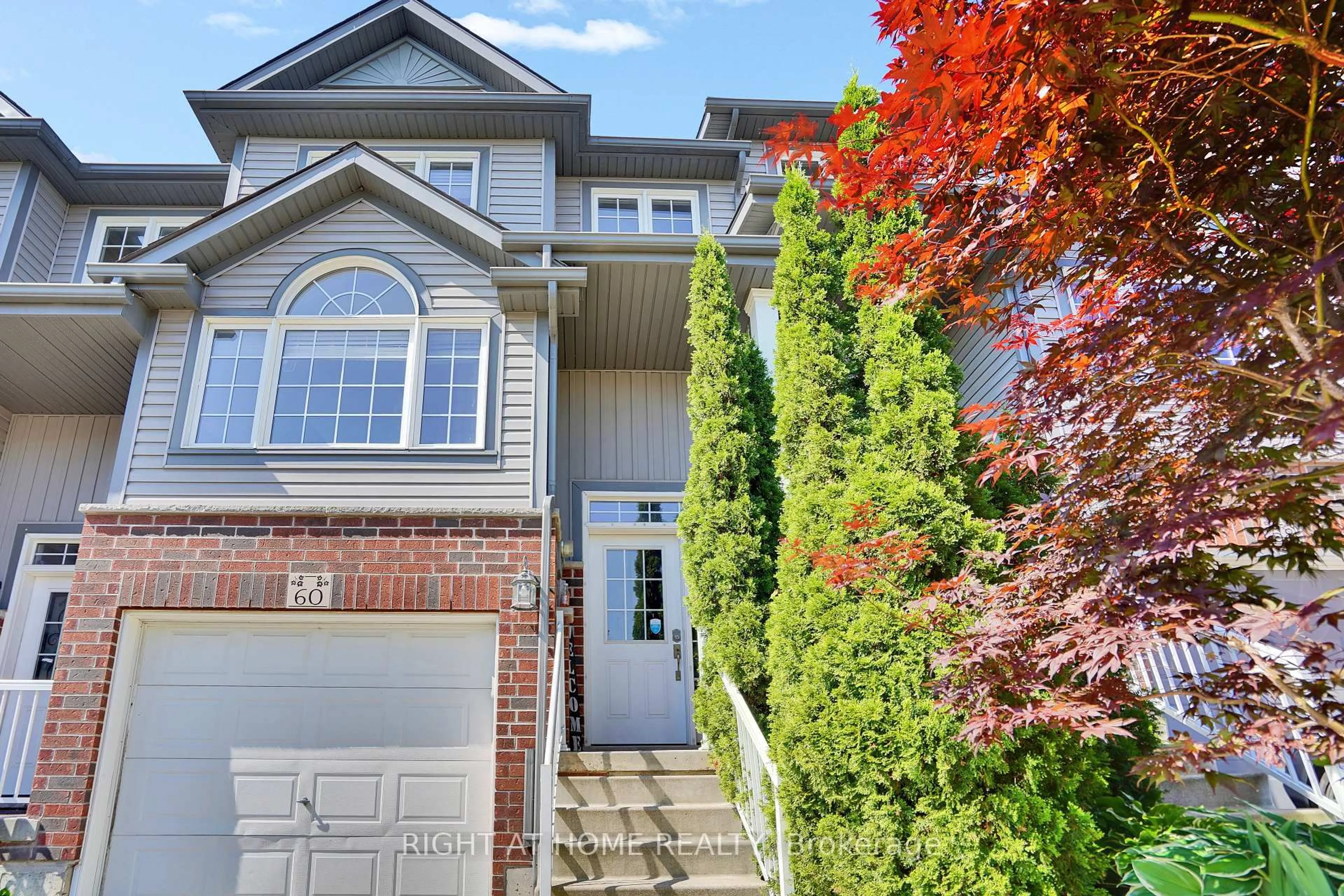 Home with vinyl exterior material, street for 60 Featherstone St, Kitchener Ontario N2R 1Z2
