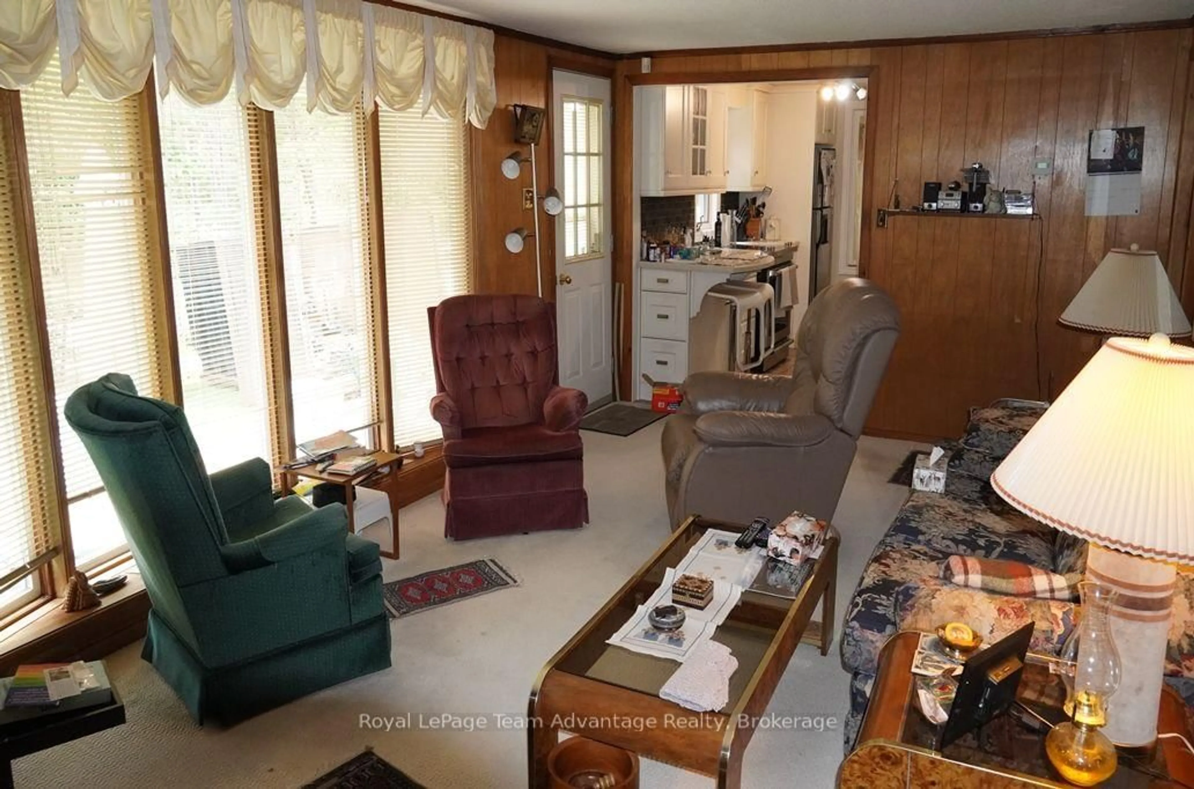 Living room with furniture, unknown for 101 & 99 Carling Bay Rd, Carling Ontario P0G 1G0