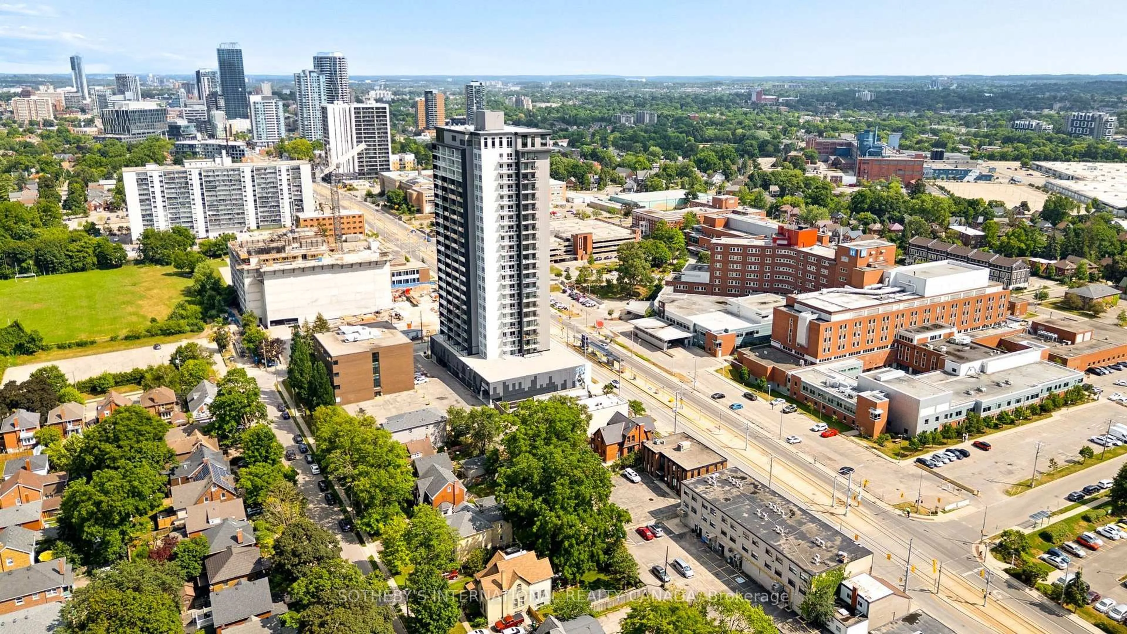 A pic from outside/outdoor area/front of a property/back of a property/a pic from drone, city buildings view from balcony for 19 Mary St, Kitchener Ontario N2H 3P9
