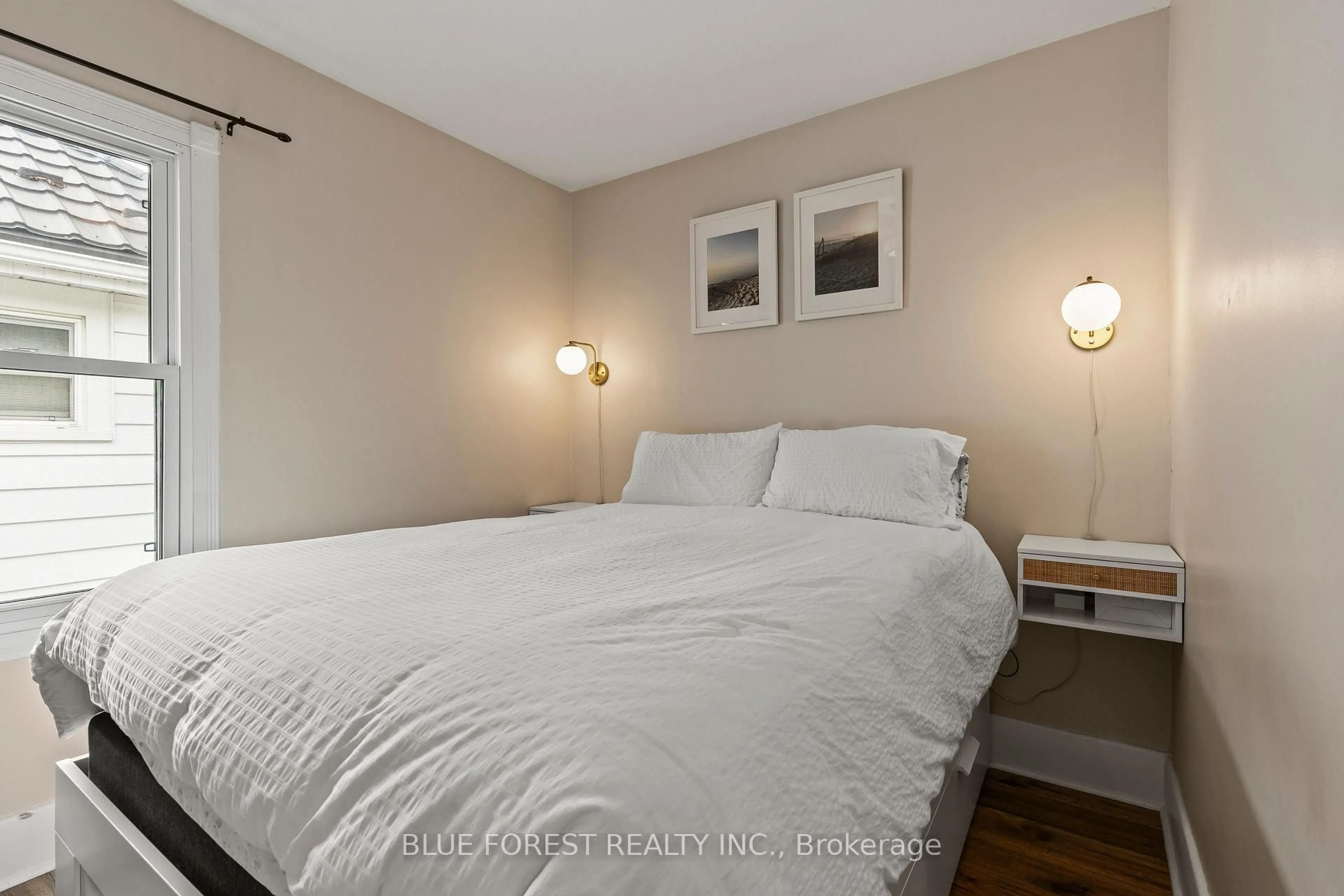 Bedroom with bed, wood/laminate floor for 31 Eastman Ave, London East Ontario N5W 2M3