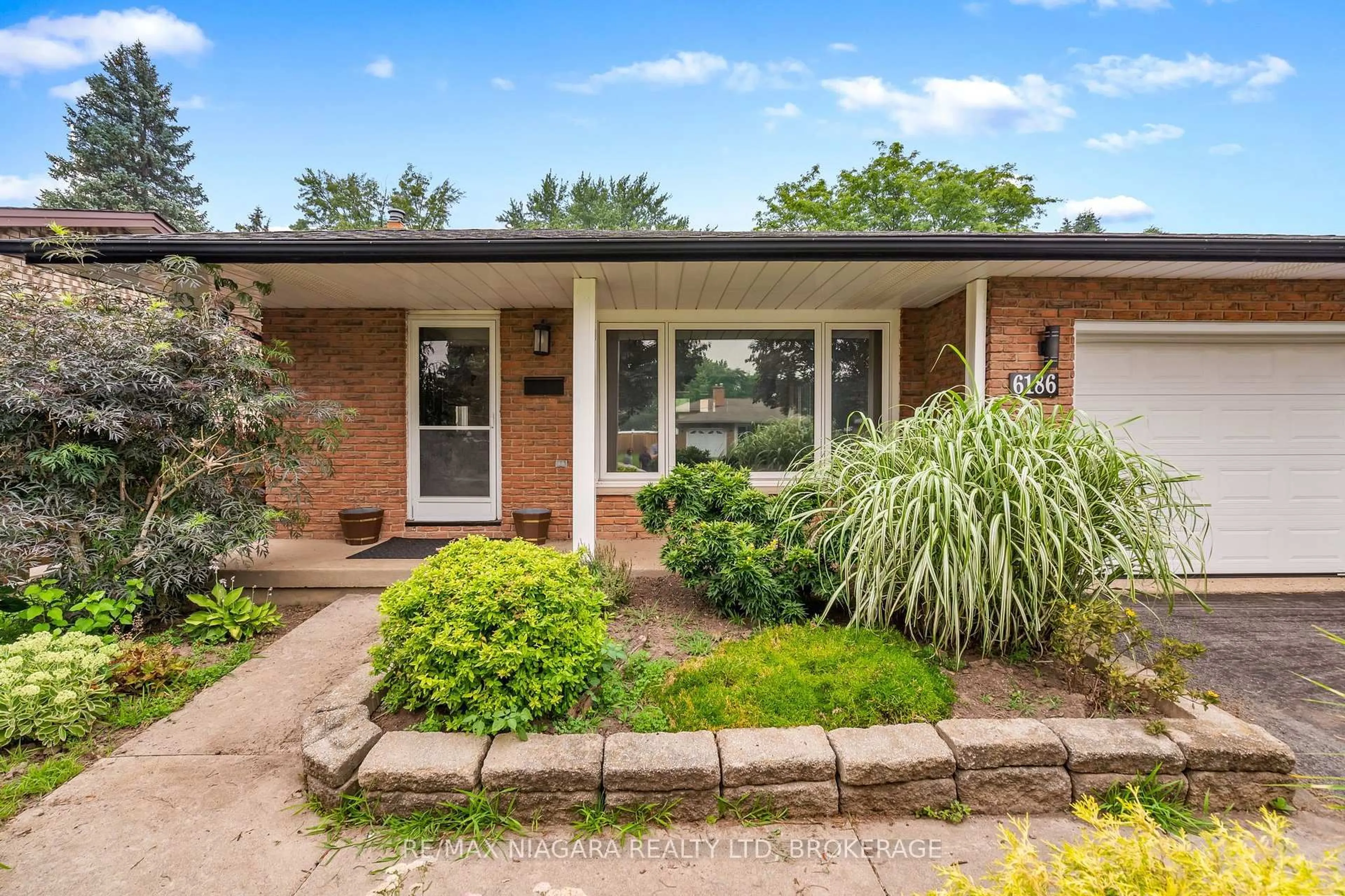 Home with brick exterior material, street for 6186 Delta Dr, Niagara Falls Ontario L2H 2G8