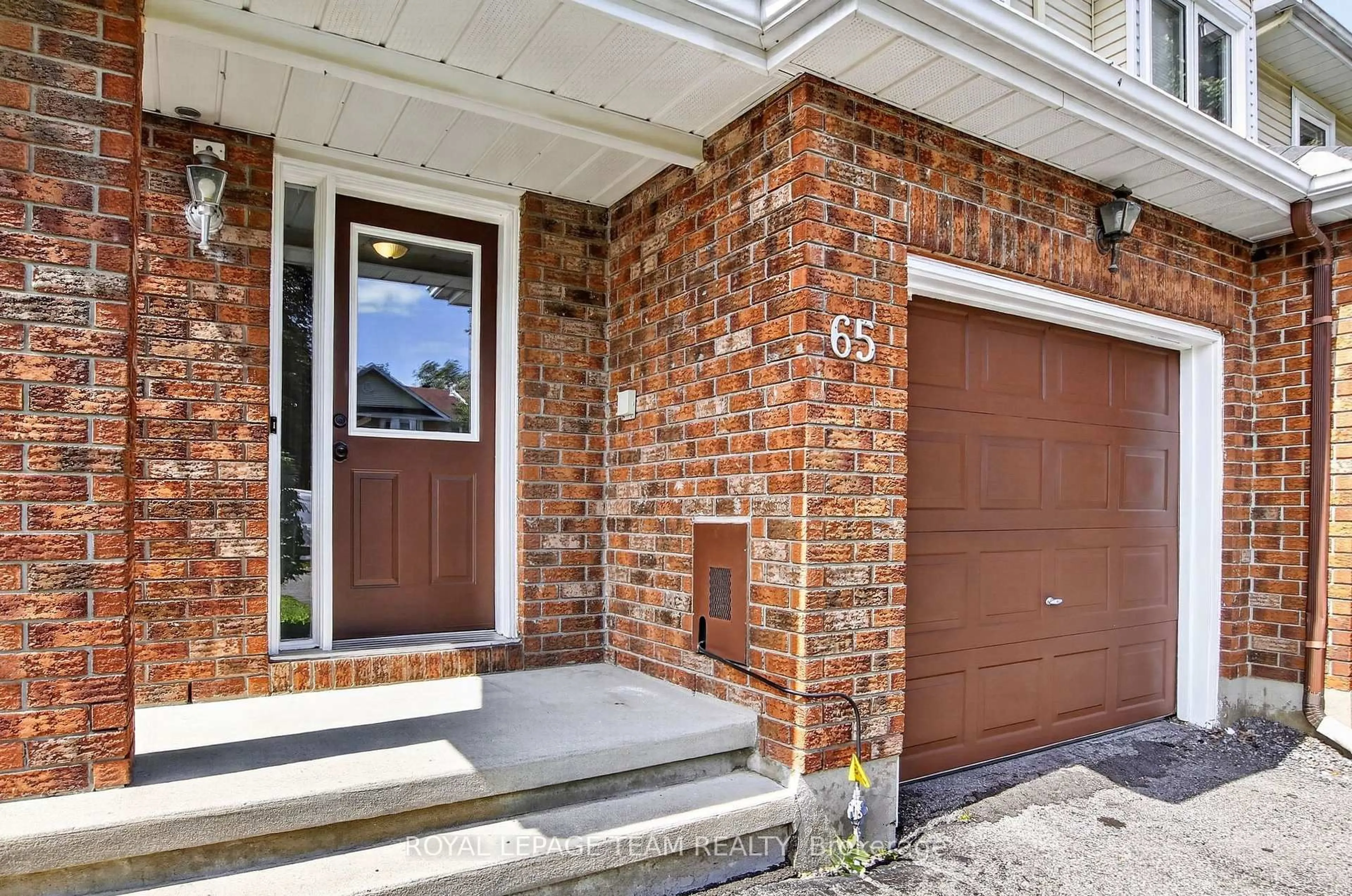 Home with brick exterior material, street for 65 Woodpark Way, Ottawa Ontario K2J 4C6