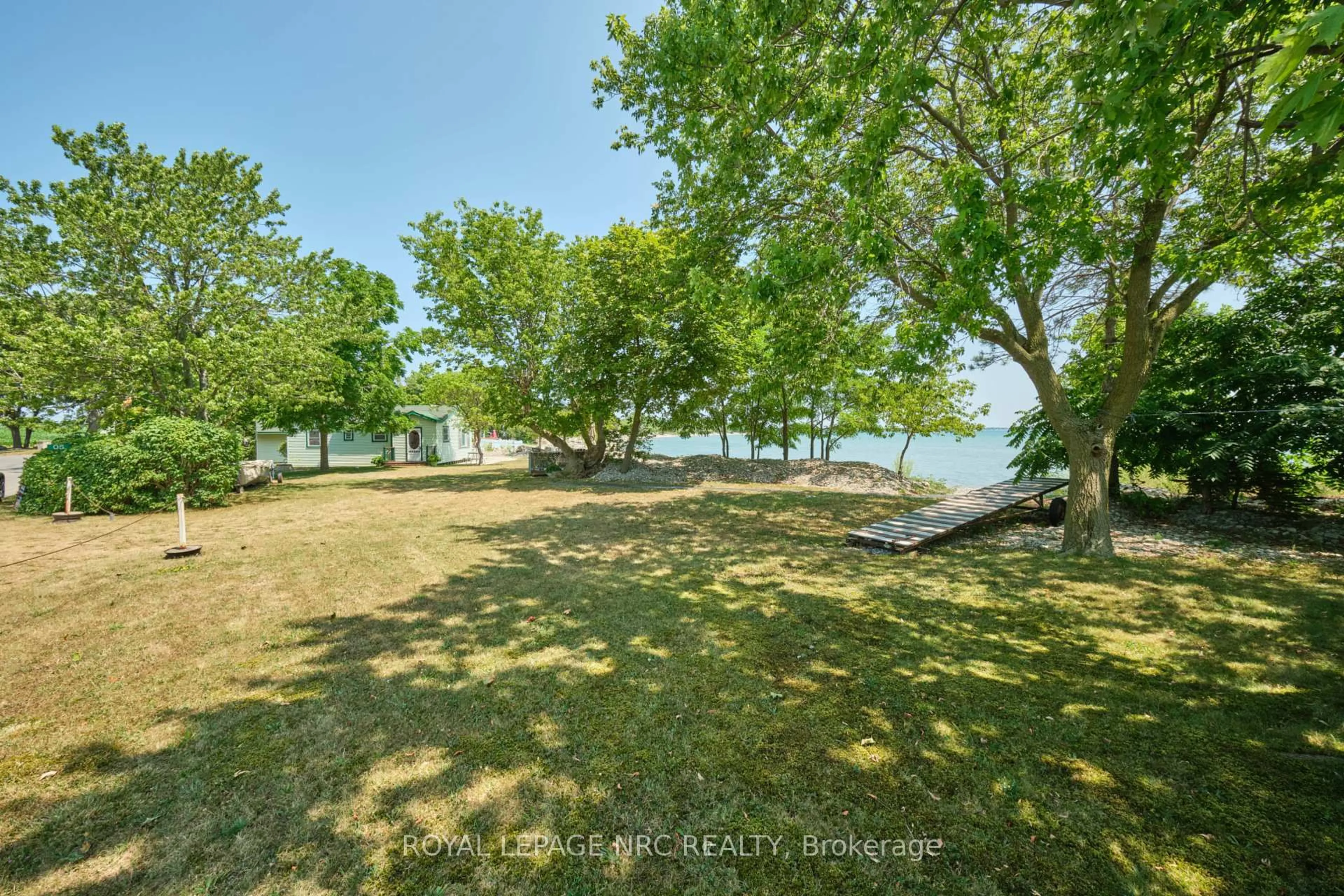 A pic from outside/outdoor area/front of a property/back of a property/a pic from drone, water/lake/river/ocean view for 5 Mohawk Point Rd, Haldimand Ontario N0A 1K0