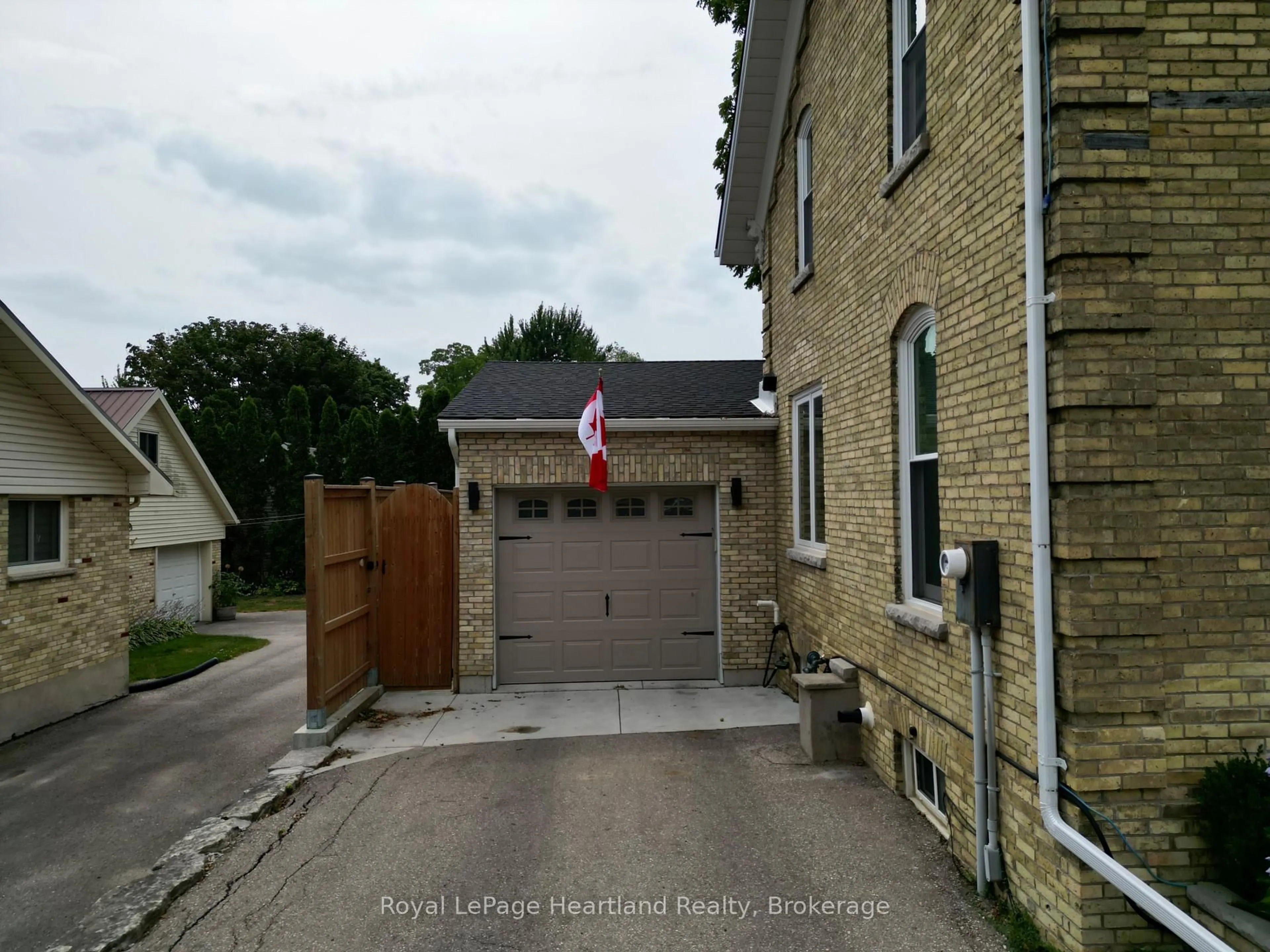 A pic from outside/outdoor area/front of a property/back of a property/a pic from drone, street for 425 William St, South Huron Ontario N0M 1S2