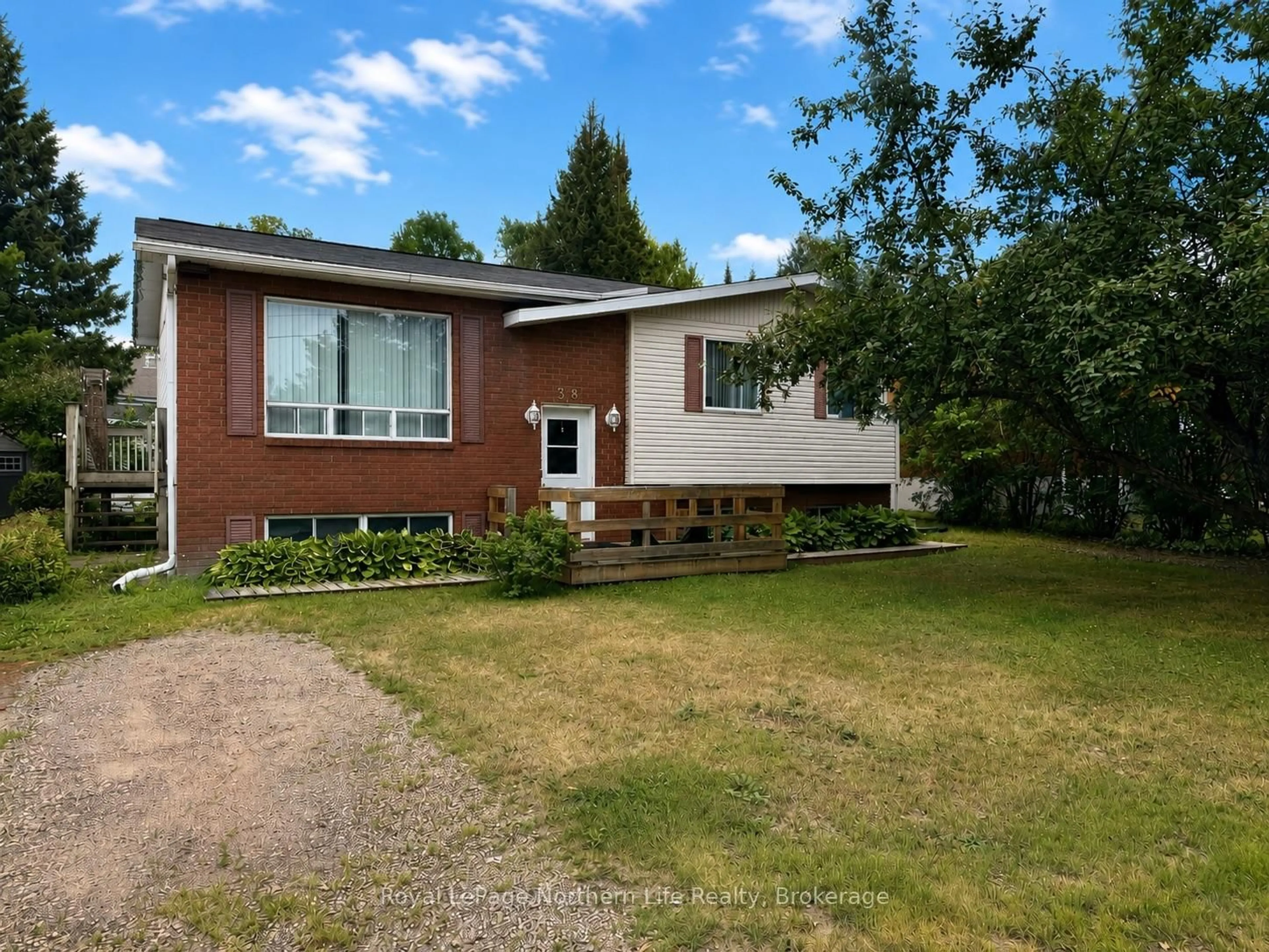 A pic from outside/outdoor area/front of a property/back of a property/a pic from drone, street for 38 Big Bend Ave, Powassan Ontario P0H 1Z0