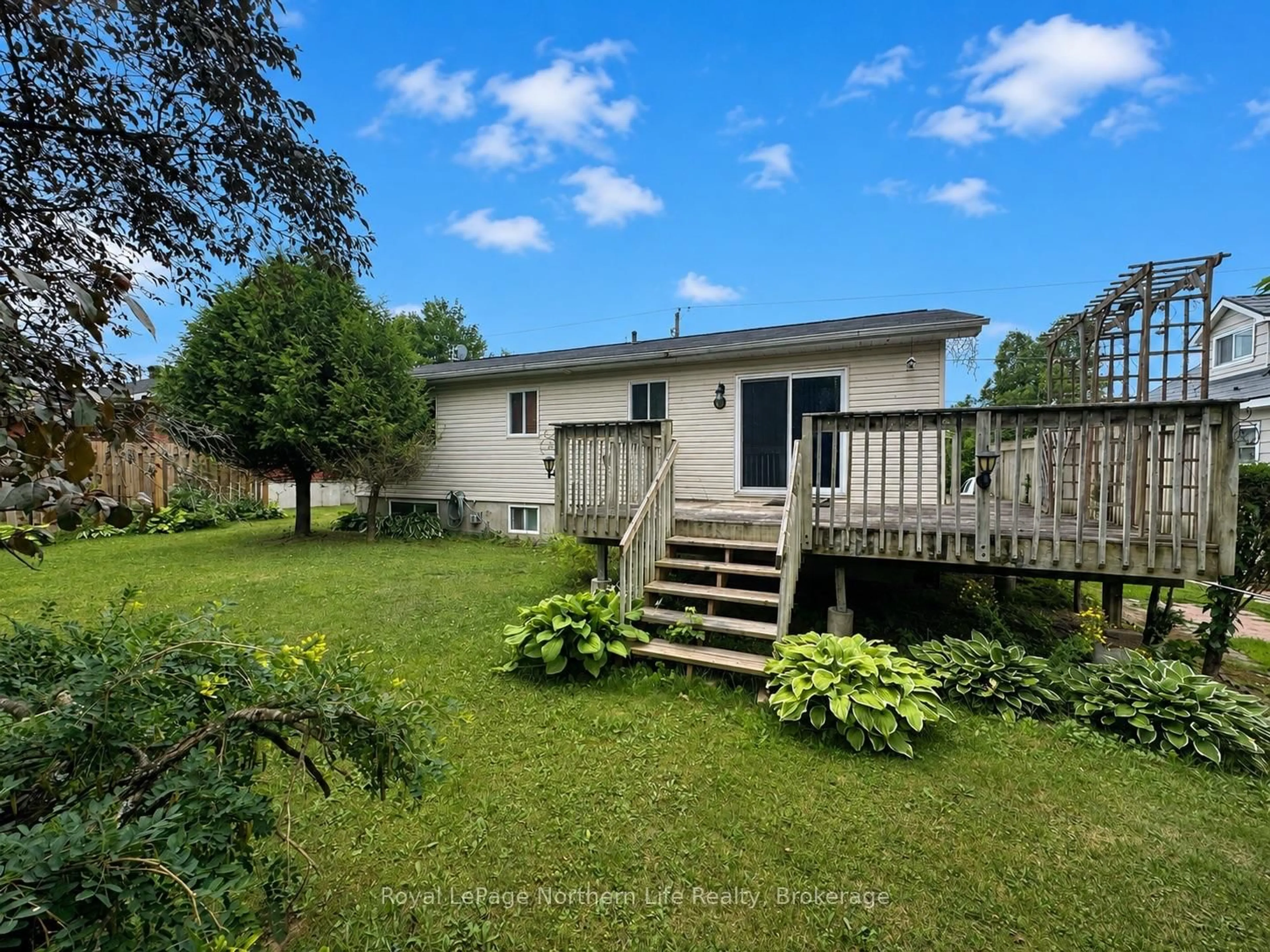 A pic from outside/outdoor area/front of a property/back of a property/a pic from drone, water/lake/river/ocean view for 38 Big Bend Ave, Powassan Ontario P0H 1Z0