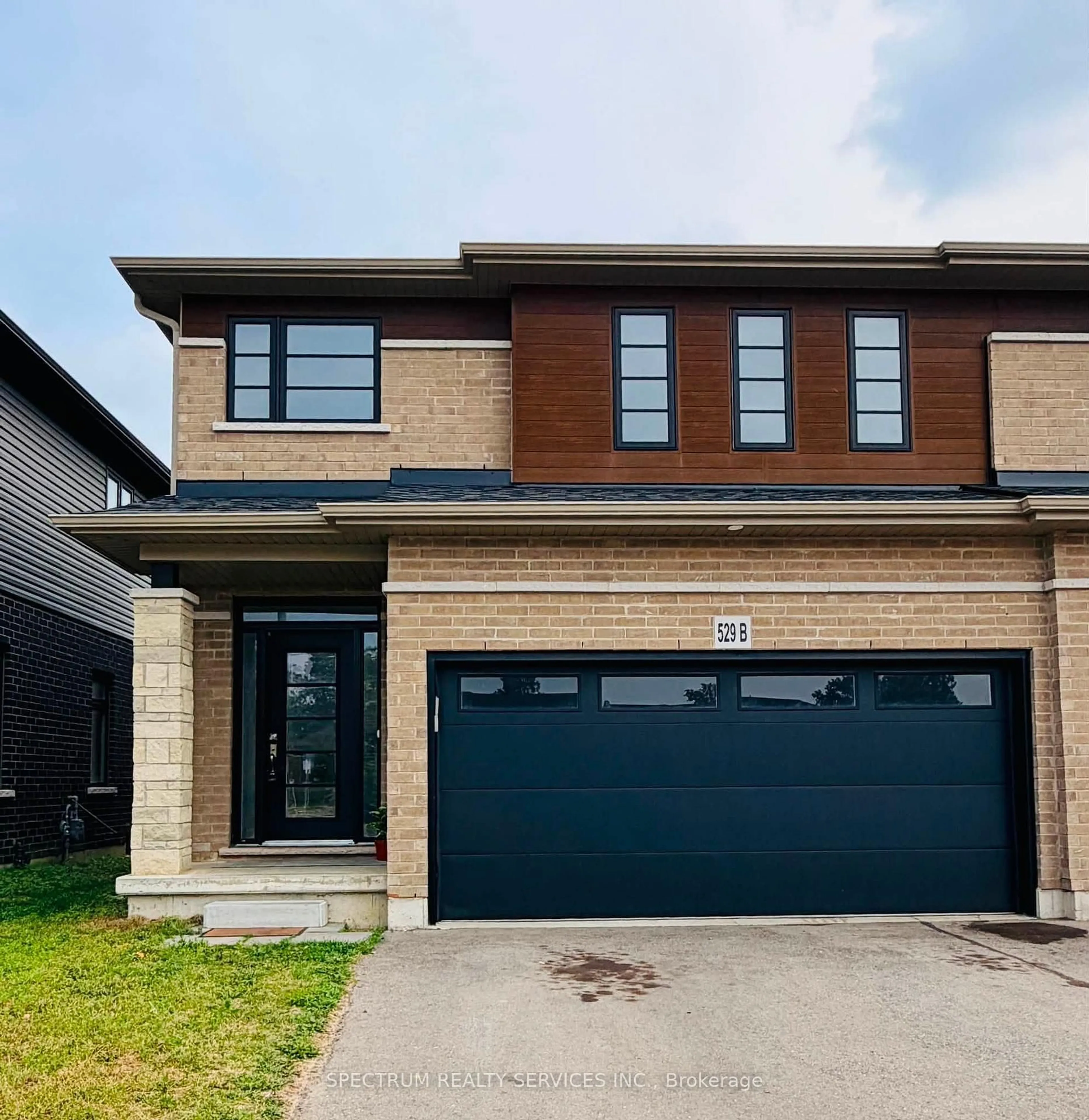 Home with brick exterior material, street for 529B Grey St, Brantford Ontario N3S 0C3