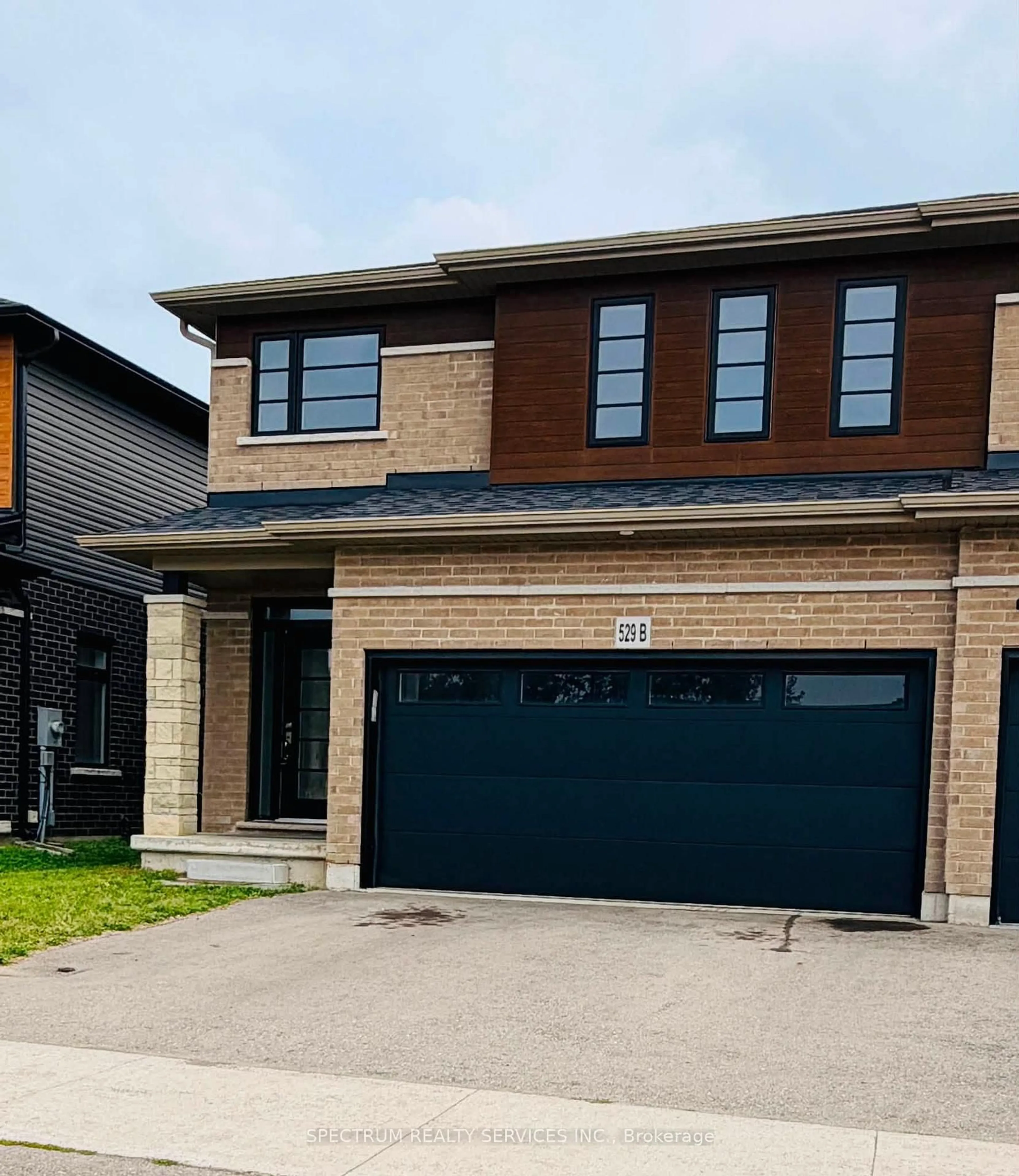 Home with brick exterior material, street for 529B Grey St, Brantford Ontario N3S 0C3