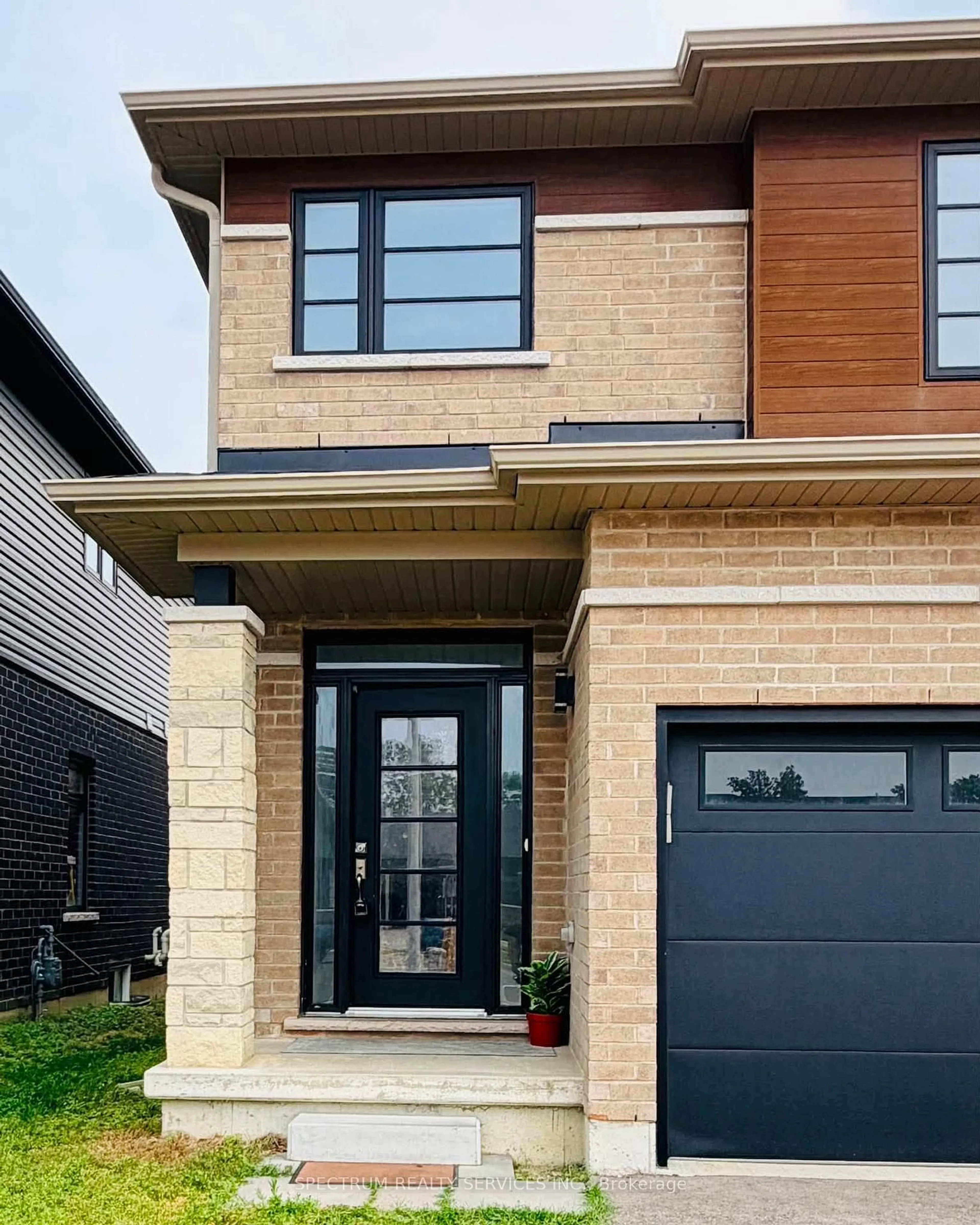 Home with brick exterior material, street for 529B Grey St, Brantford Ontario N3S 0C3