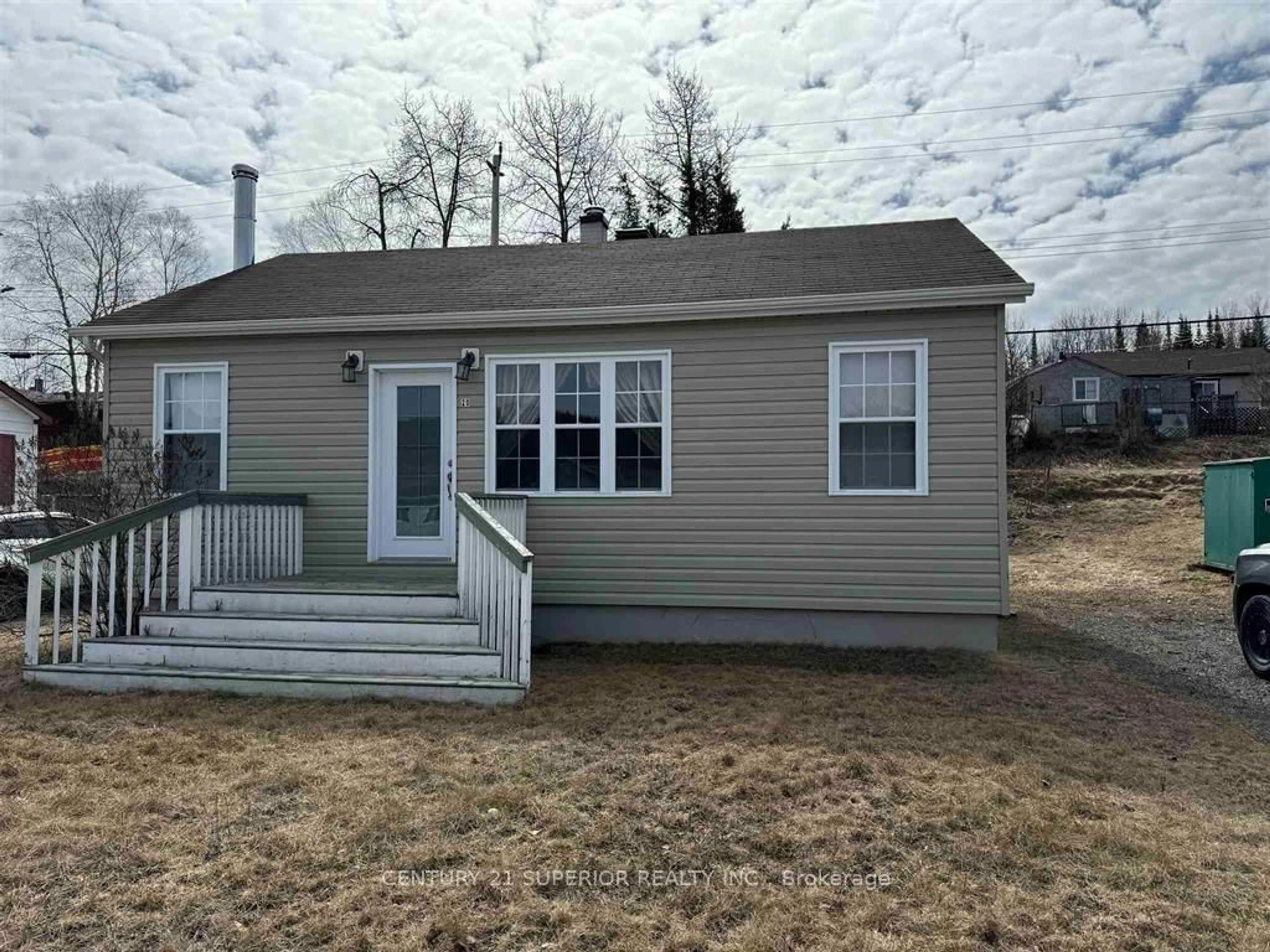 Home with vinyl exterior material, street for 20 Neebig Ave, Manitouwadge Ontario P0T 2C0