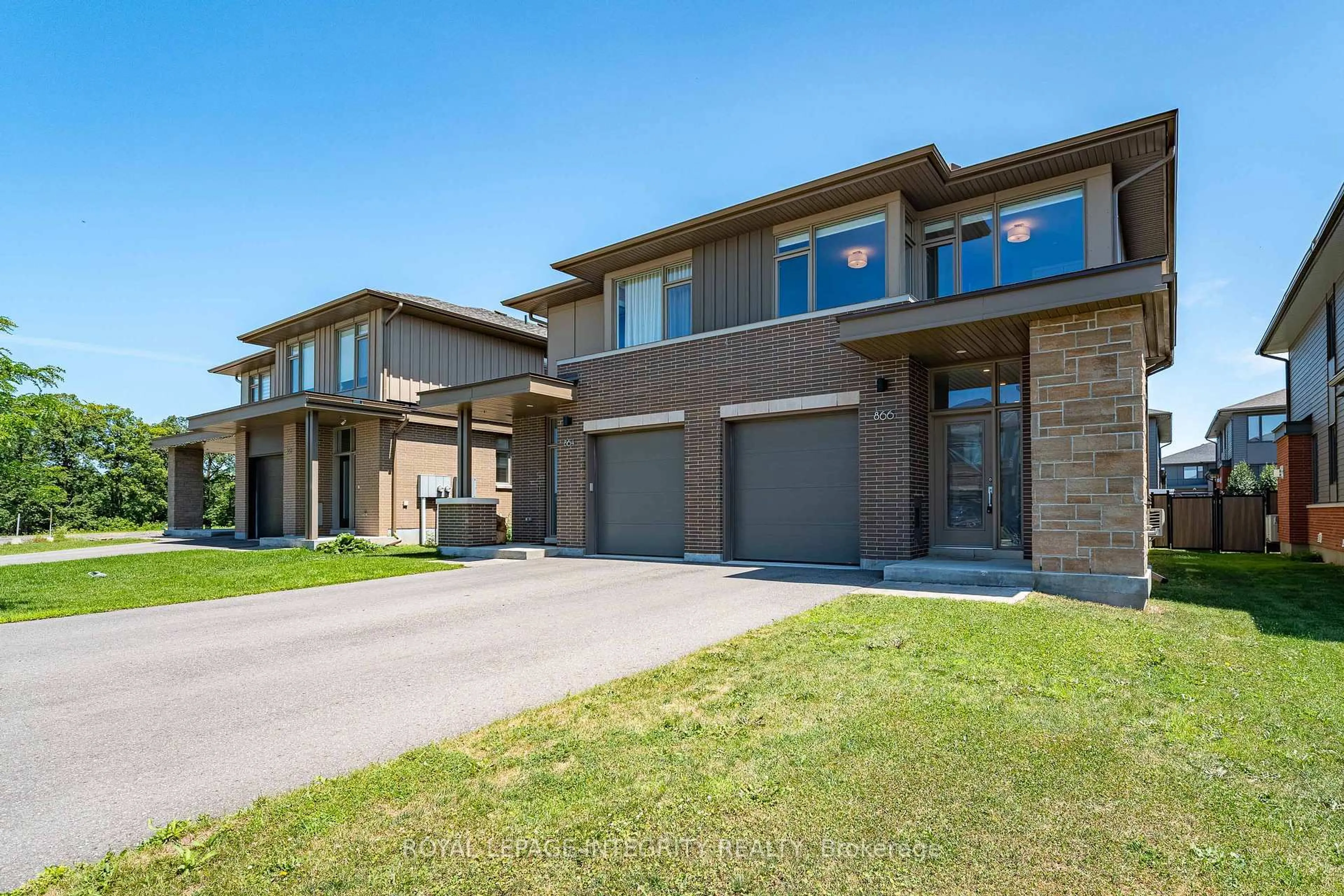 Home with brick exterior material, street for 866 Moses Tennisco St, Ottawa Ontario K1K 5A2