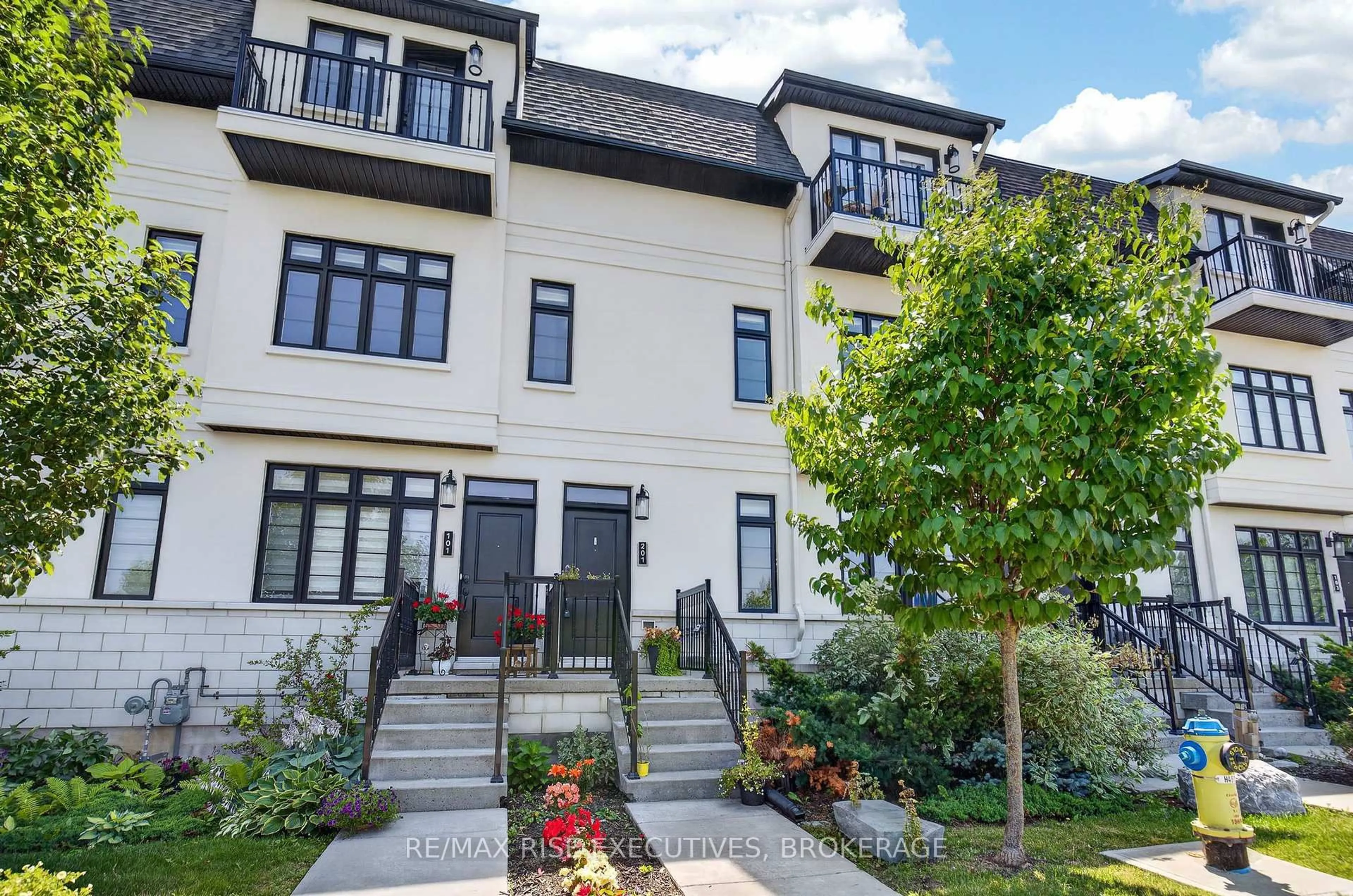 Home with brick exterior material, street for 1015 Terra Verde Way #201, Kingston Ontario K7P 0T8