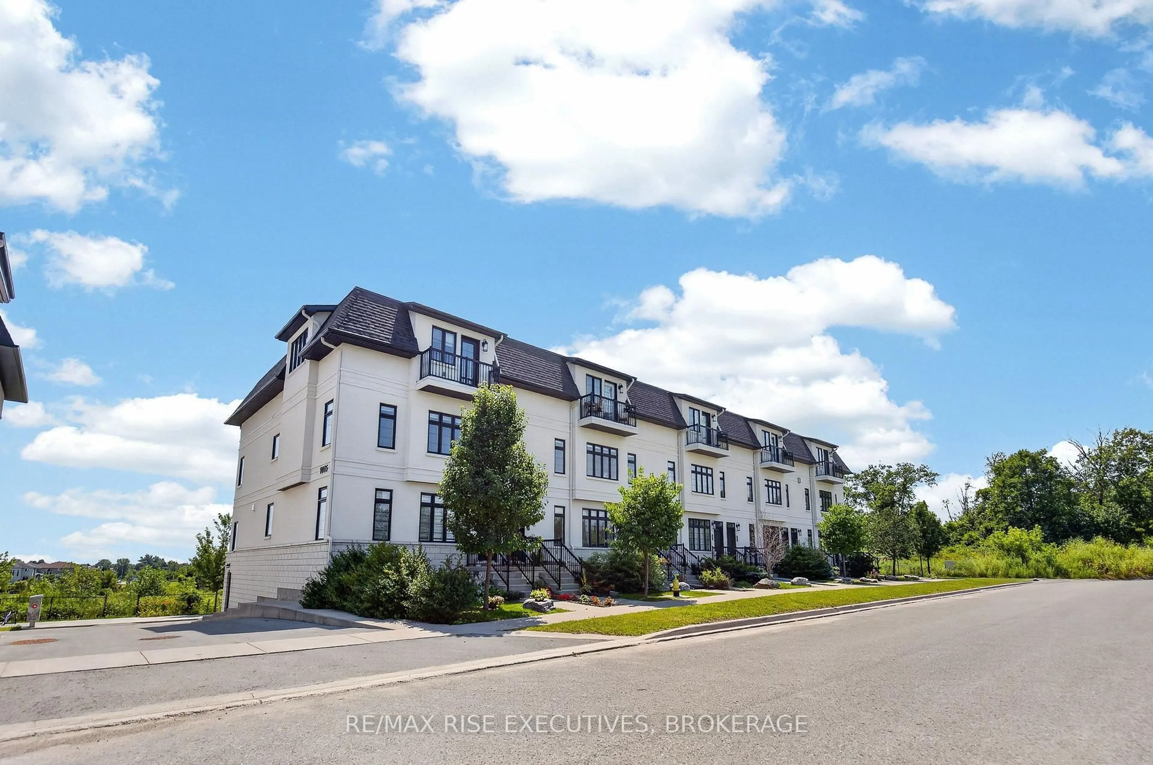 A pic from outside/outdoor area/front of a property/back of a property/a pic from drone, unknown for 1015 Terra Verde Way #201, Kingston Ontario K7P 0T8