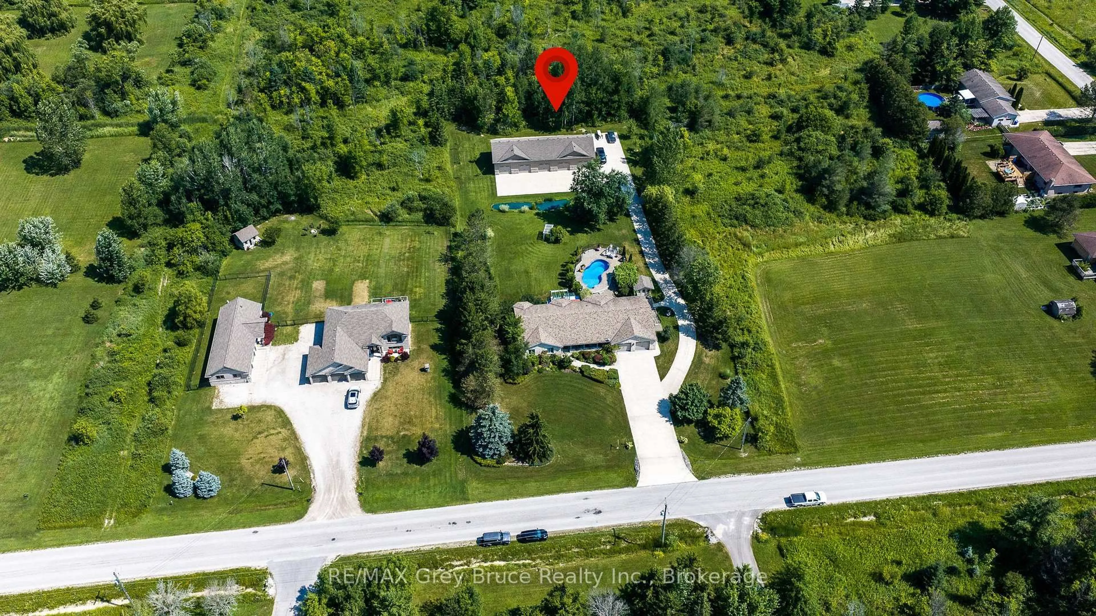 A pic from outside/outdoor area/front of a property/back of a property/a pic from drone, street for 913 27th St, Georgian Bluffs Ontario N4K 5N4