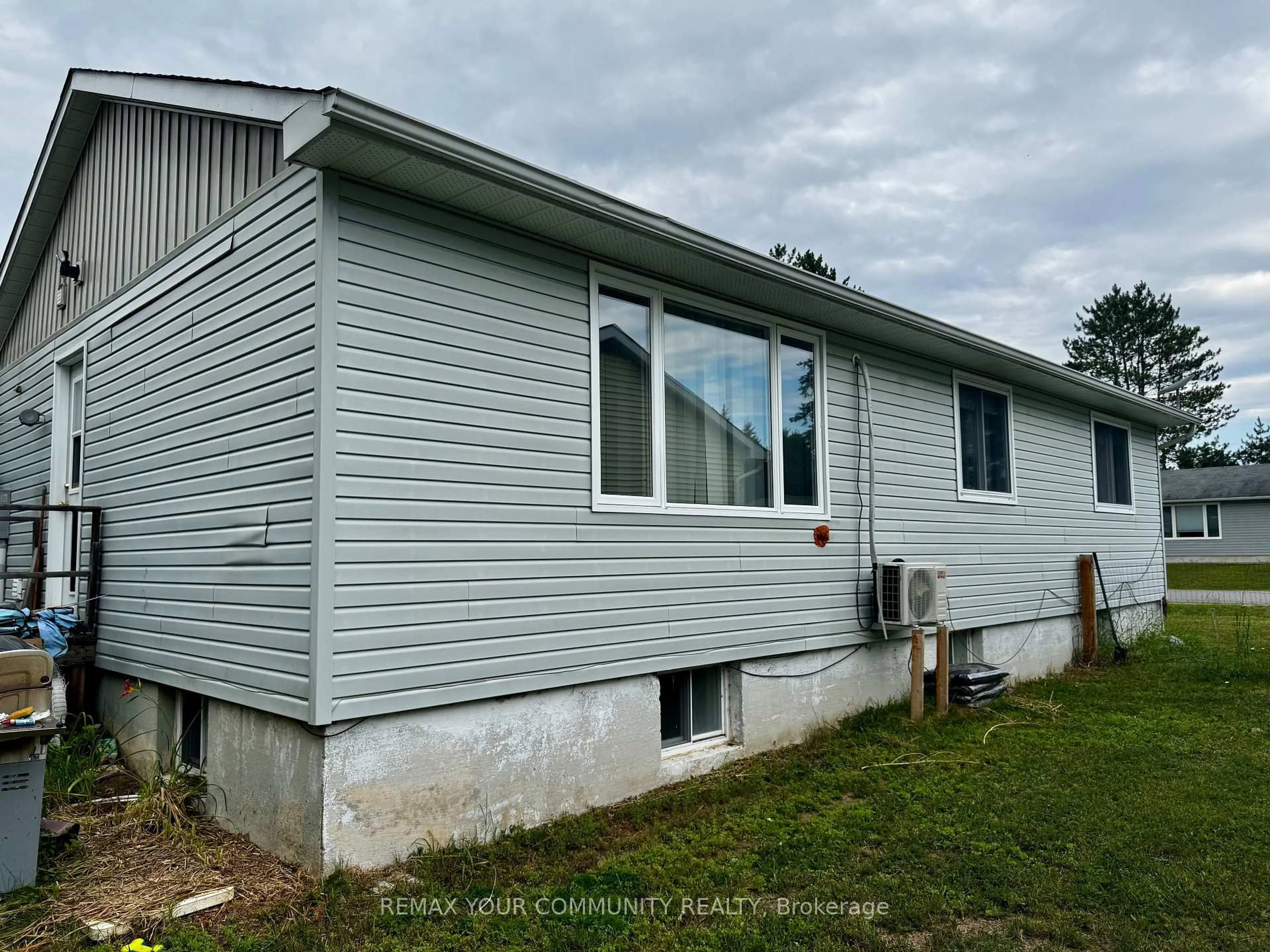 Home with vinyl exterior material, building for 42 Sprucedale St, Highlands East Ontario K0L 1M0