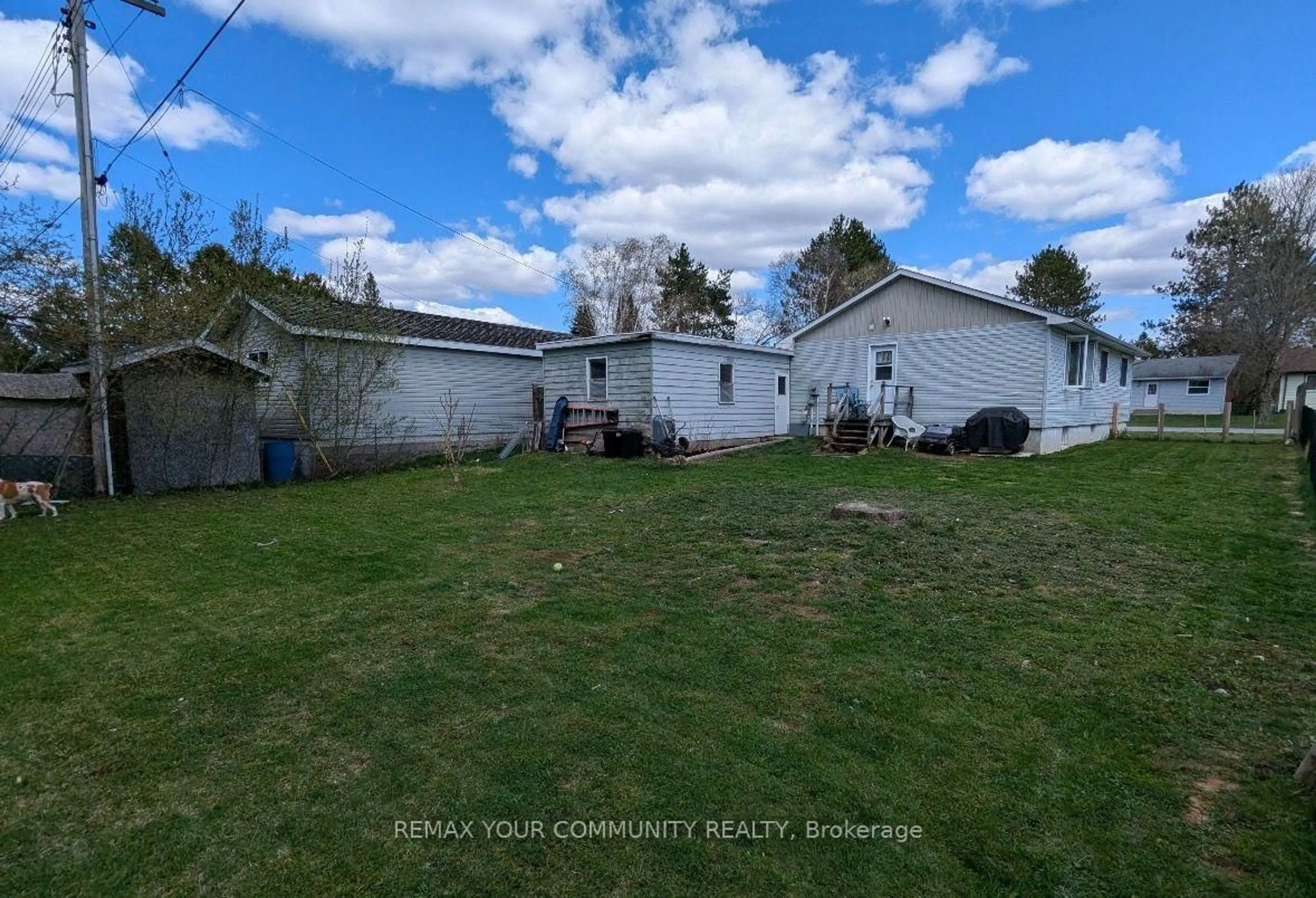 A pic from outside/outdoor area/front of a property/back of a property/a pic from drone, unknown for 42 Sprucedale St, Highlands East Ontario K0L 1M0