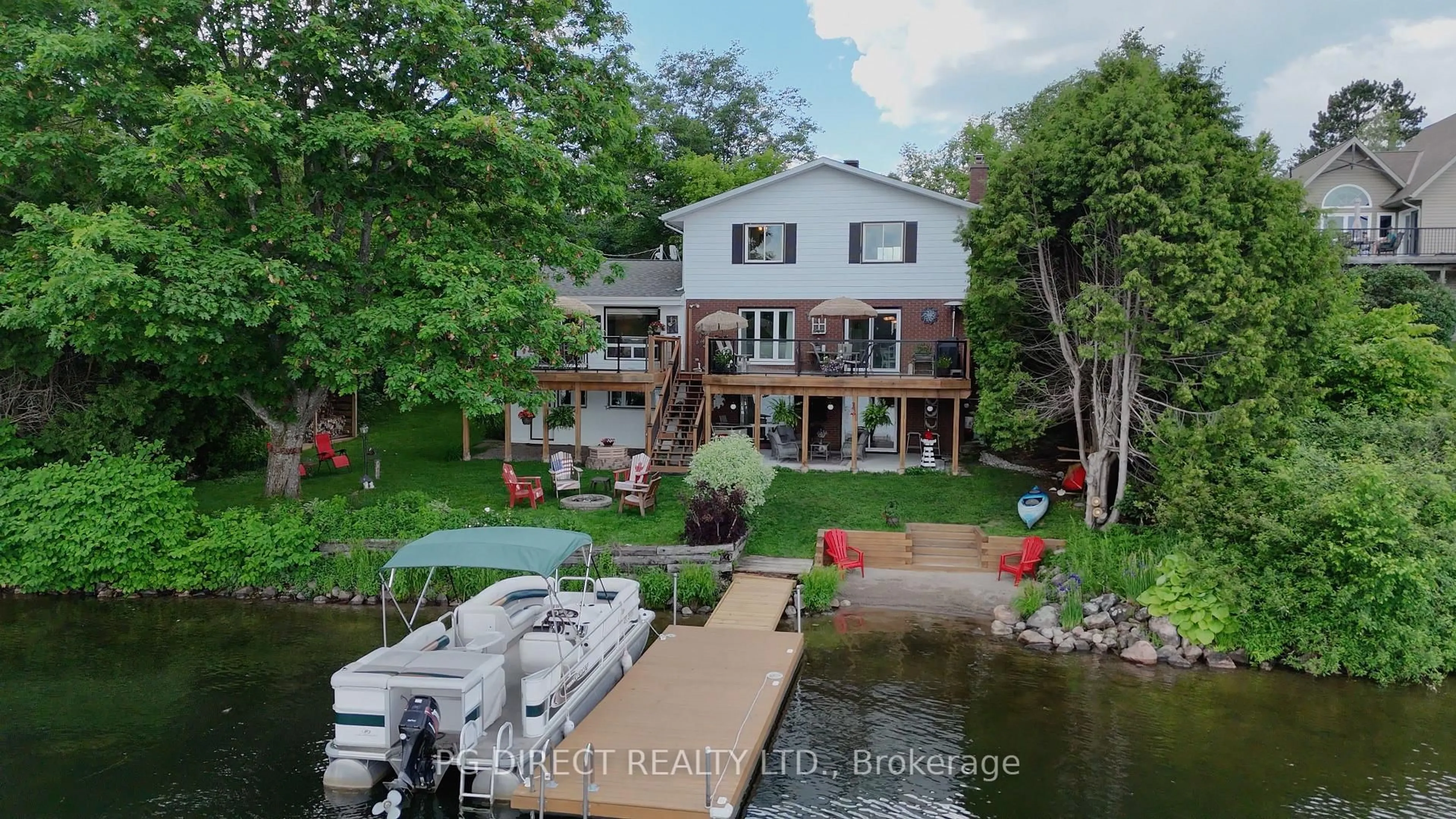 A pic from outside/outdoor area/front of a property/back of a property/a pic from drone, water/lake/river/ocean view for 13 Sure Strike Rd, East Ferris Ontario P0H 1B0