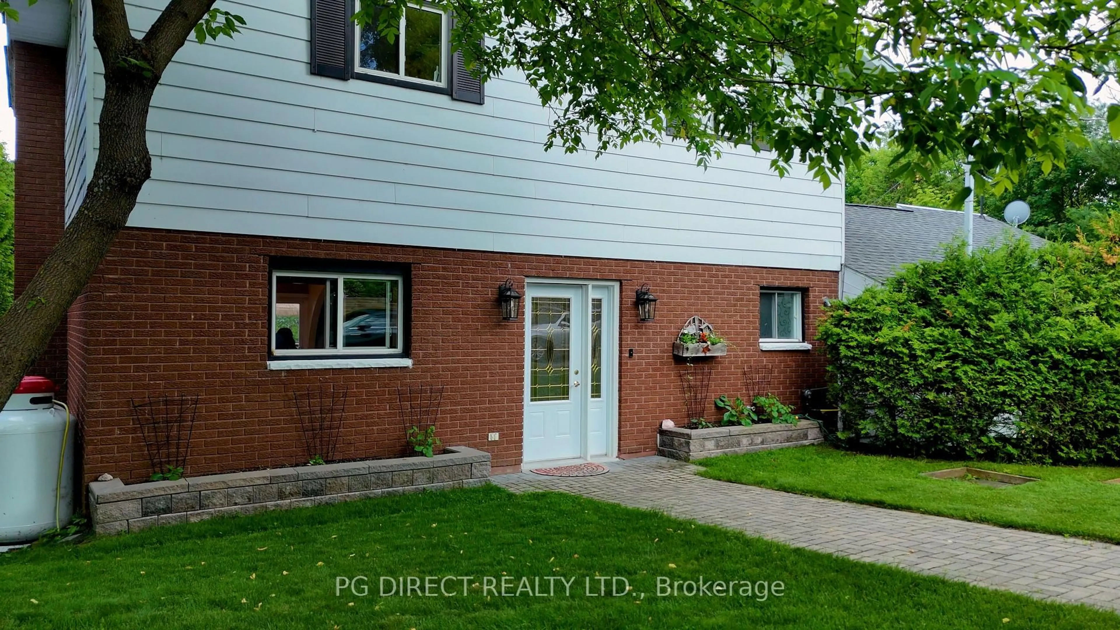 Home with brick exterior material, street for 13 Sure Strike Rd, East Ferris Ontario P0H 1B0