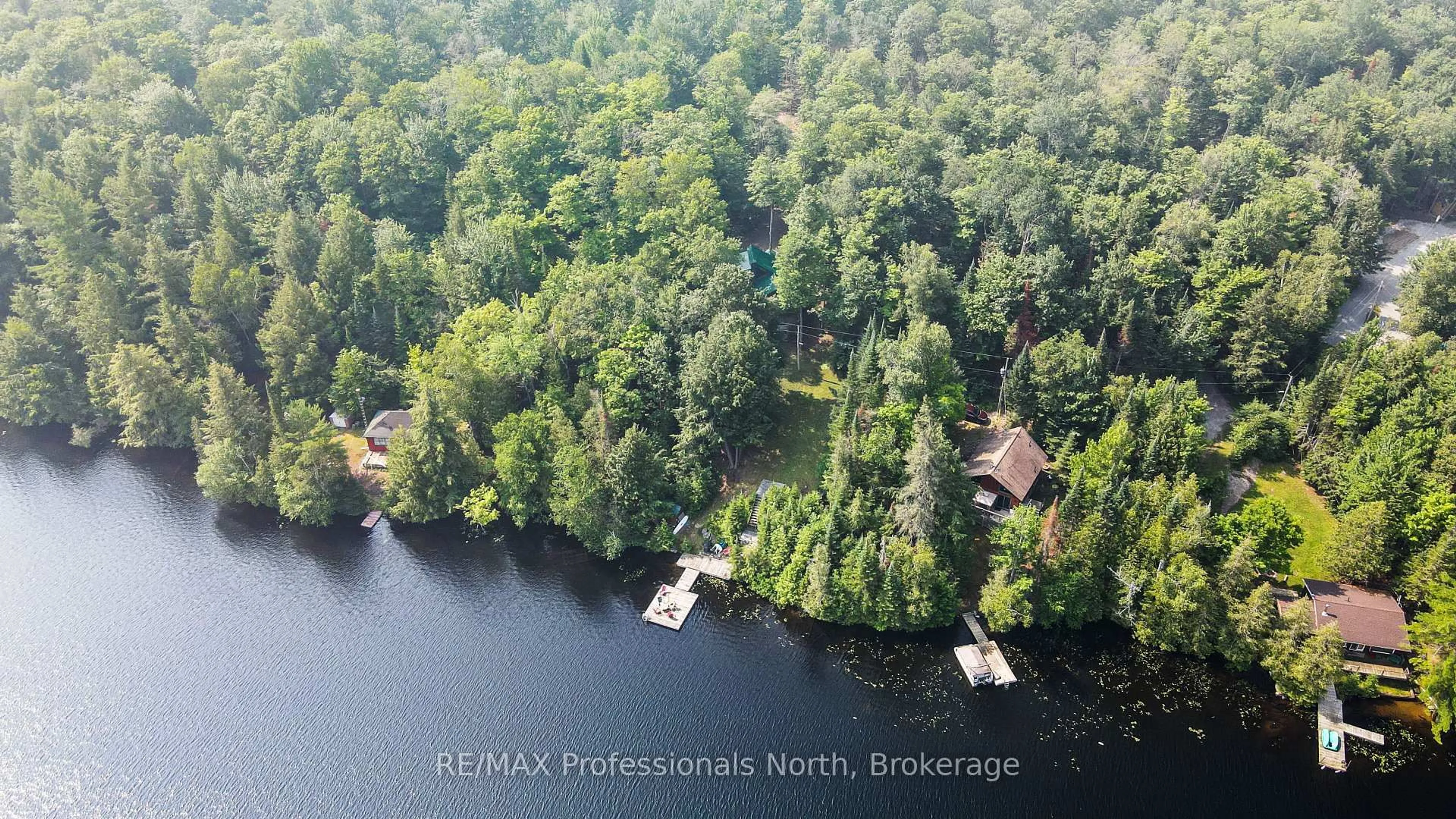 A pic from outside/outdoor area/front of a property/back of a property/a pic from drone, water/lake/river/ocean view for 1087 Westfall Lane, Highlands East Ontario K0L 2A0