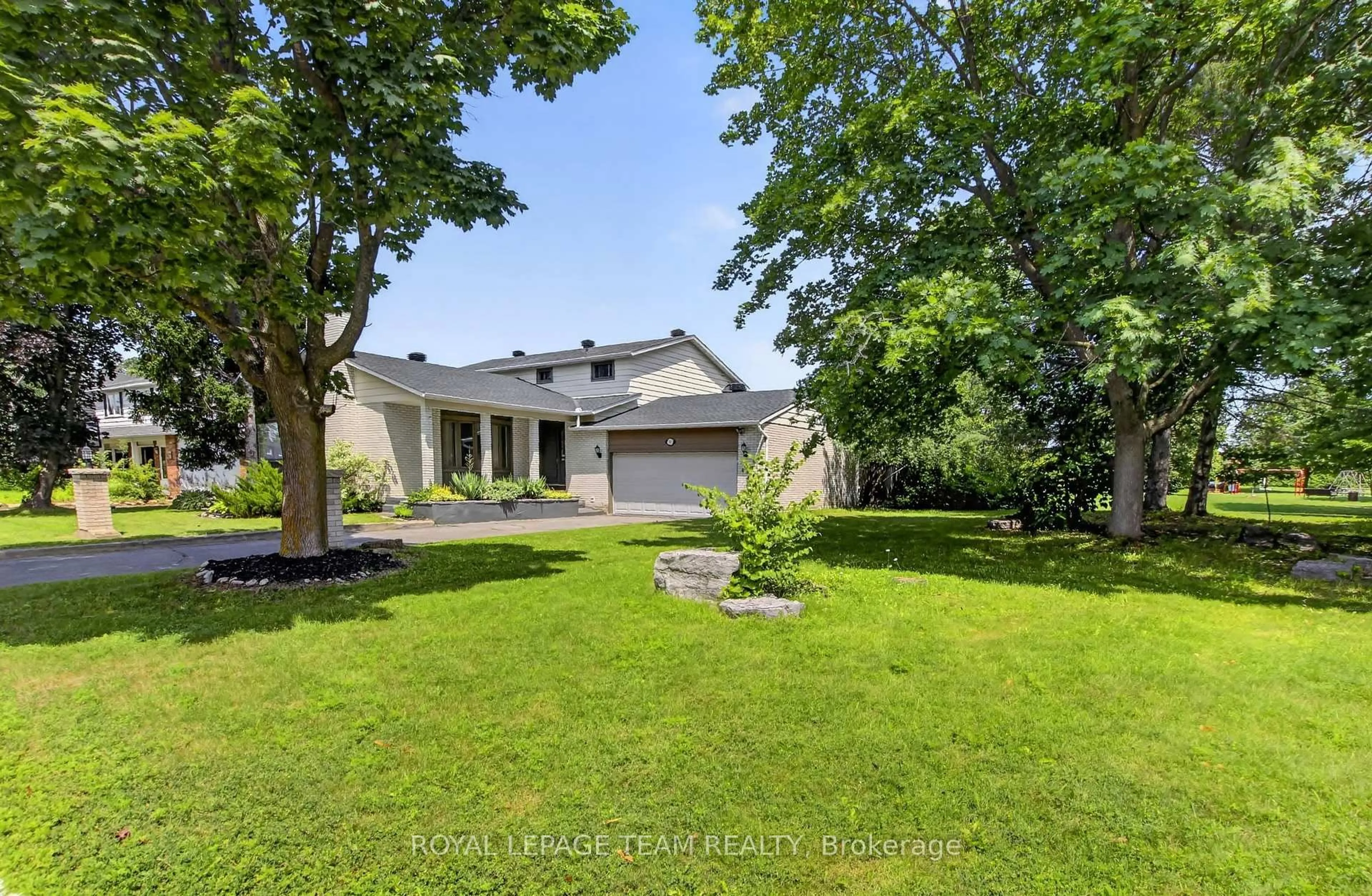 A pic from outside/outdoor area/front of a property/back of a property/a pic from drone, street for 61 Amberwood Cres, Ottawa Ontario K2E 7C2