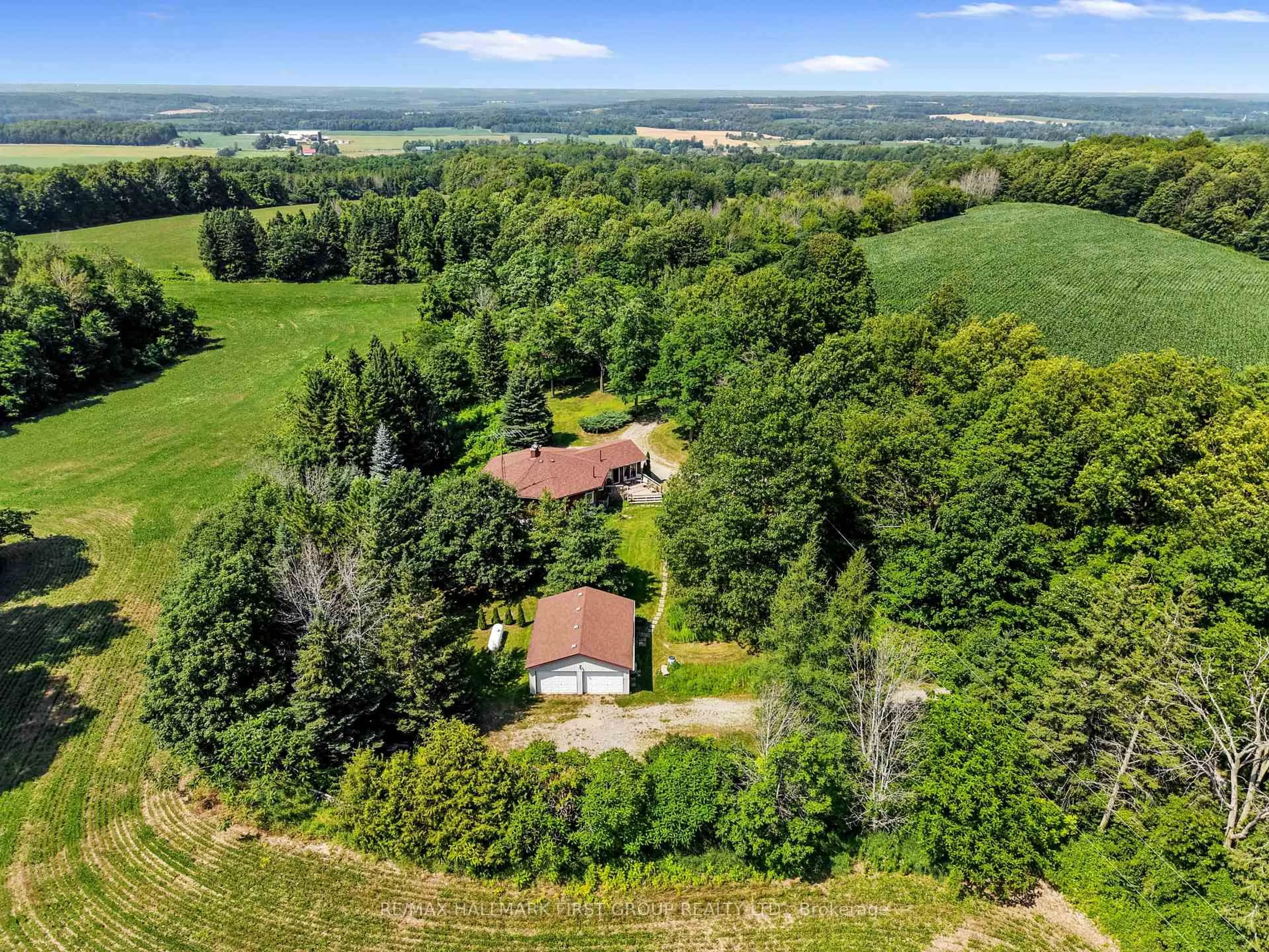 A pic from outside/outdoor area/front of a property/back of a property/a pic from drone, forest/trees view for 940 Carman Rd, Brighton Ontario K0K 1H0