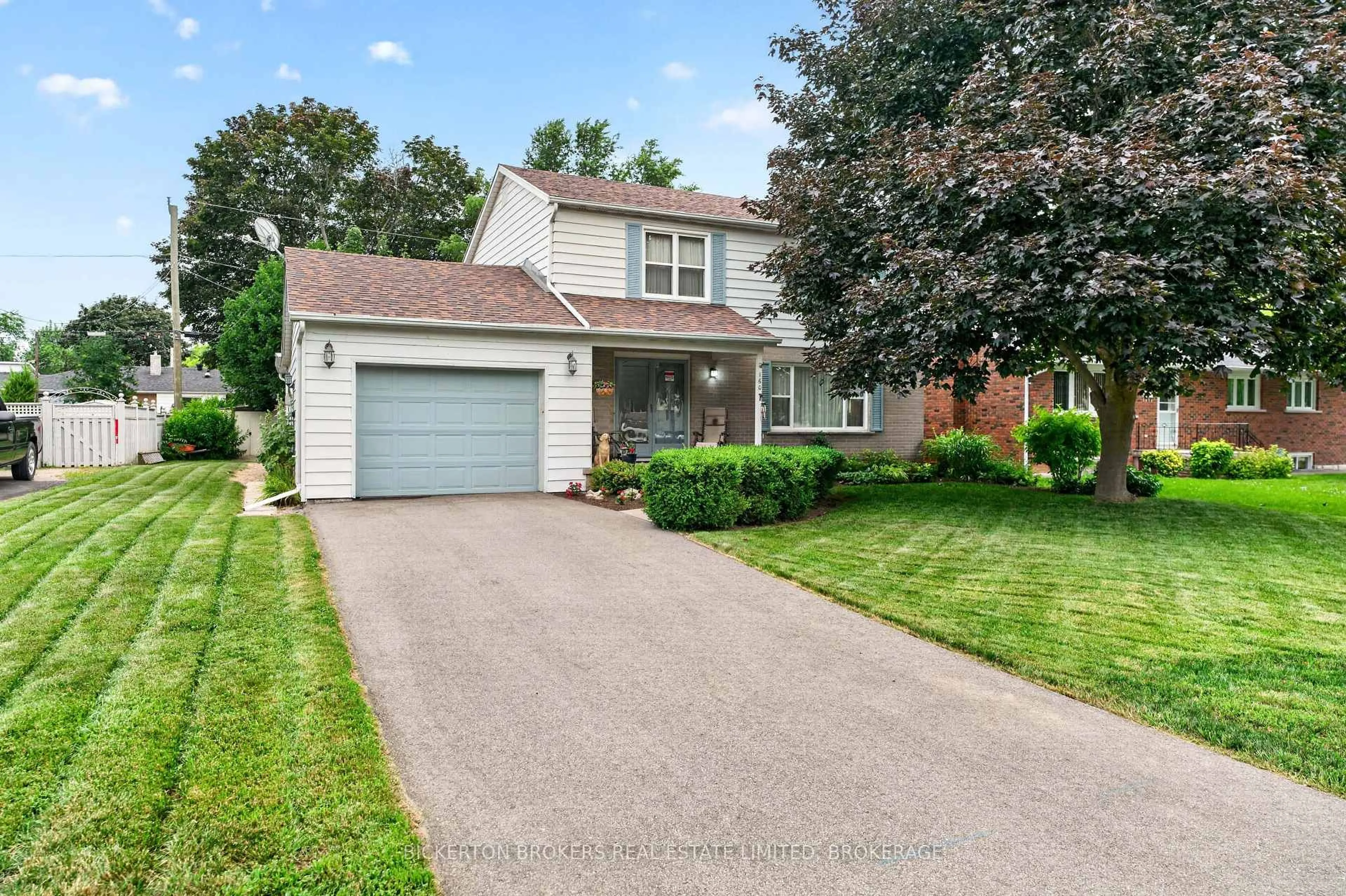Home with vinyl exterior material, street for 160 Elmwood Dr, Gananoque Ontario K7G 1N9