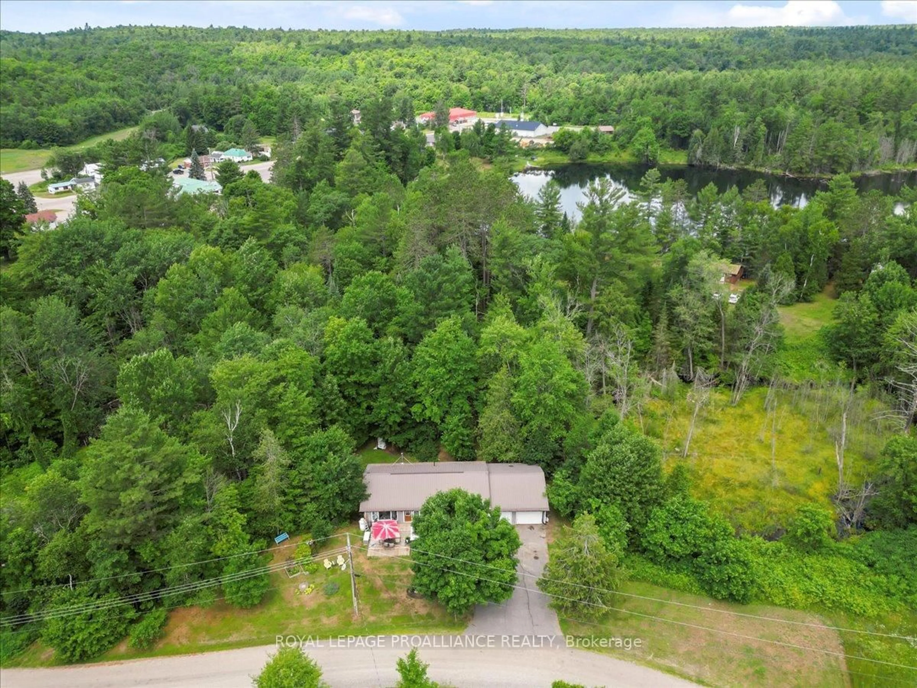 A pic from outside/outdoor area/front of a property/back of a property/a pic from drone, water/lake/river/ocean view for 1023 Jewel Rd, Cloyne Ontario K0H 1K0