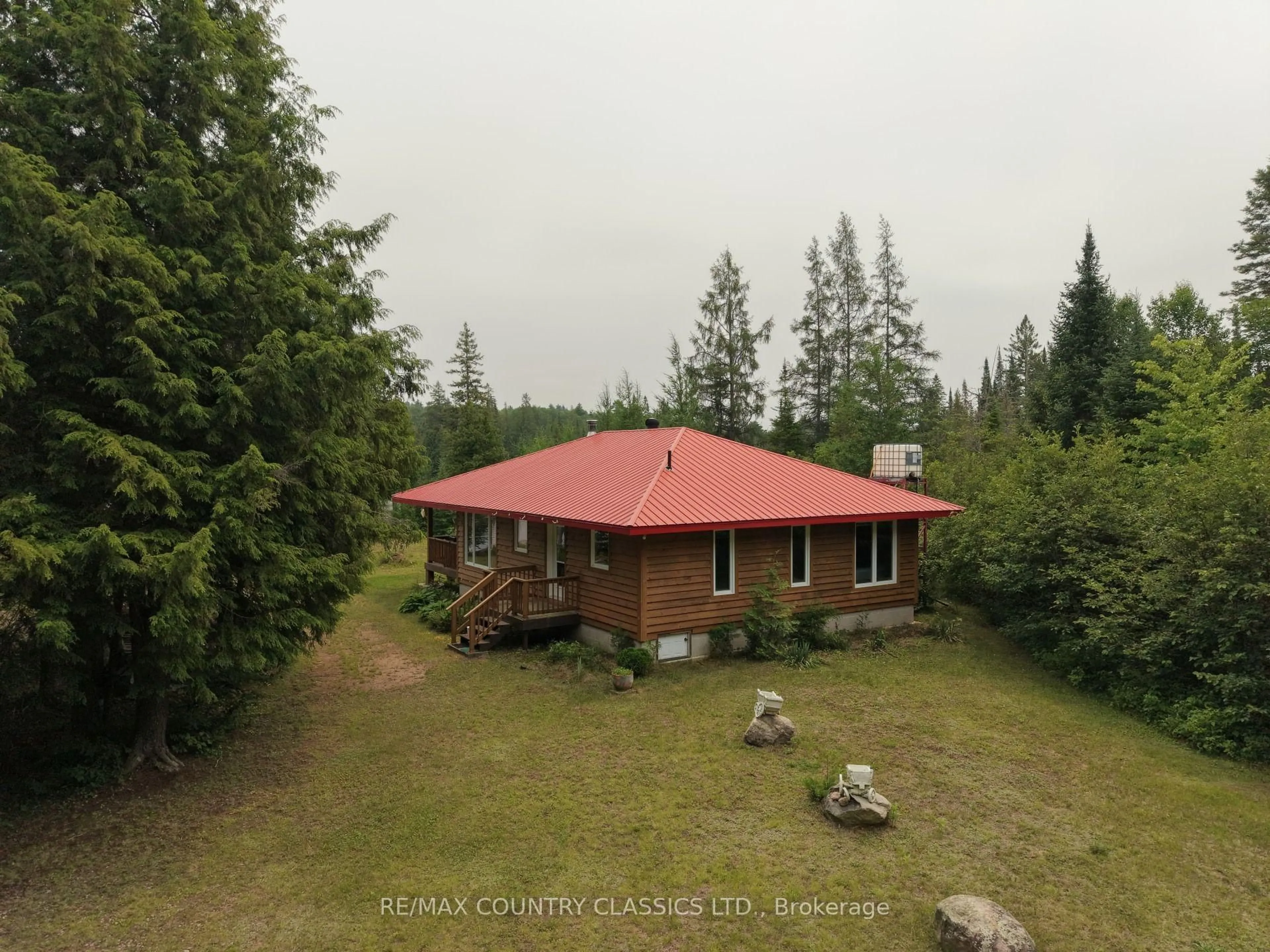 A pic from outside/outdoor area/front of a property/back of a property/a pic from drone, unknown for 66 Diatomike Lane, Quadeville Ontario K0J 2G0