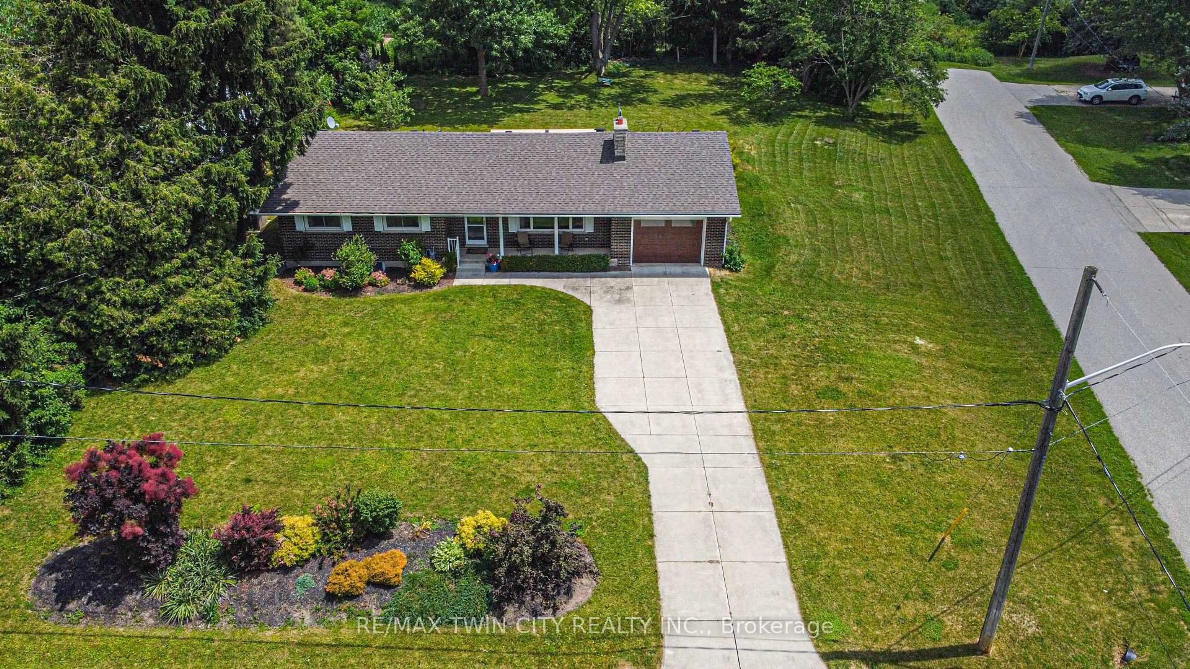 A pic from outside/outdoor area/front of a property/back of a property/a pic from drone, street for 11 Beechim Dr, Wilmot Ontario N0B 2E0