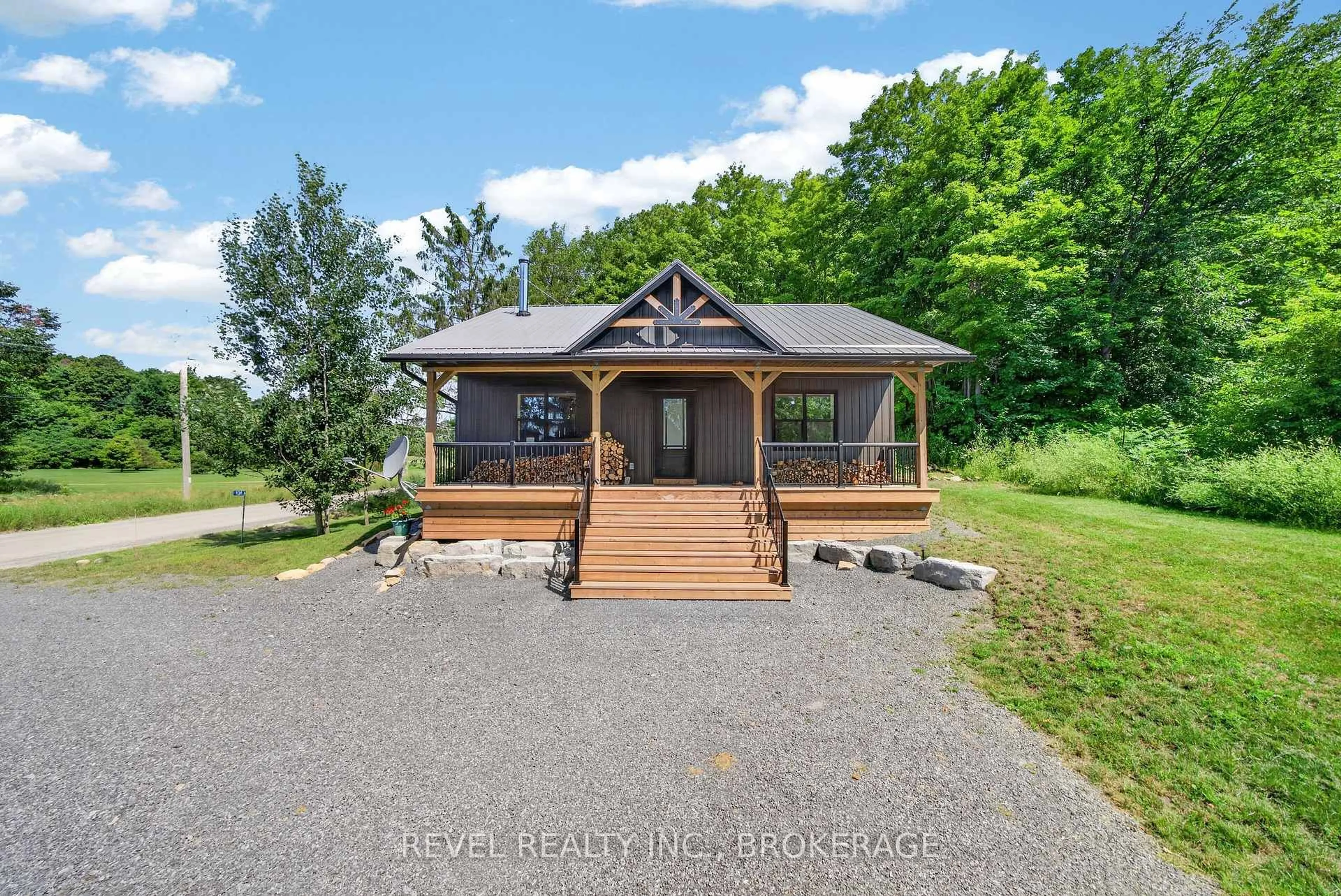 A pic from outside/outdoor area/front of a property/back of a property/a pic from drone, water/lake/river/ocean view for 106 Long Point Rd, Leeds and the Thousand Islands Ontario K0E 1N0
