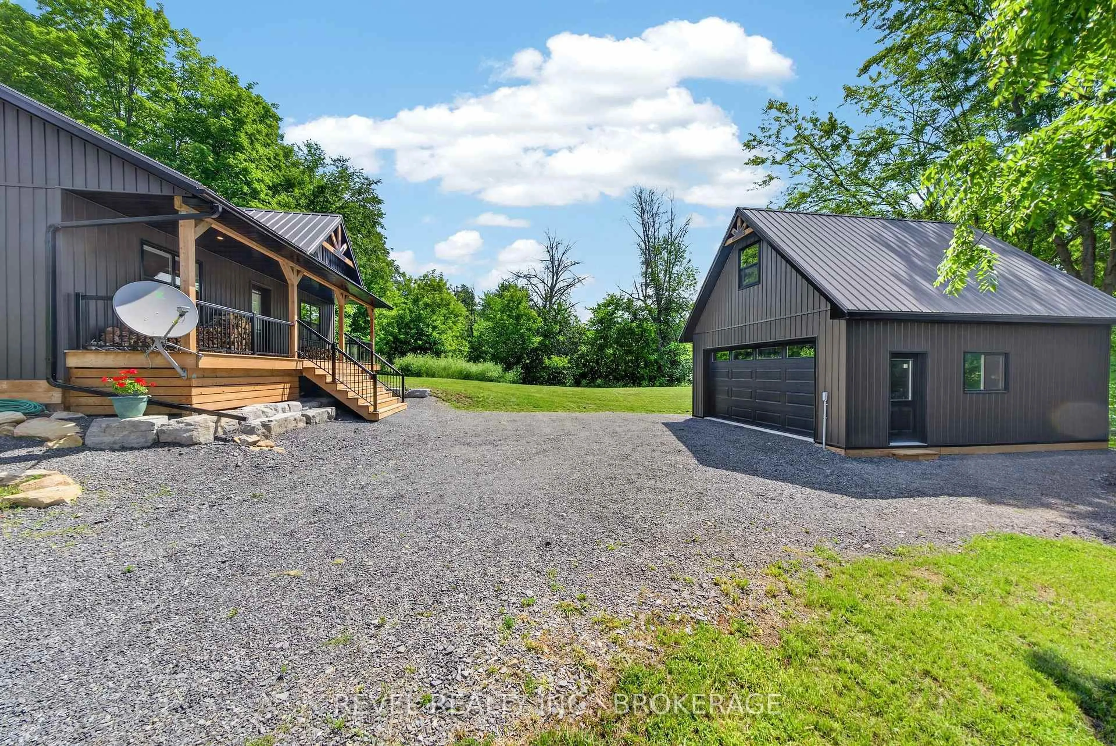 A pic from outside/outdoor area/front of a property/back of a property/a pic from drone, water/lake/river/ocean view for 106 Long Point Rd, Leeds and the Thousand Islands Ontario K0E 1N0