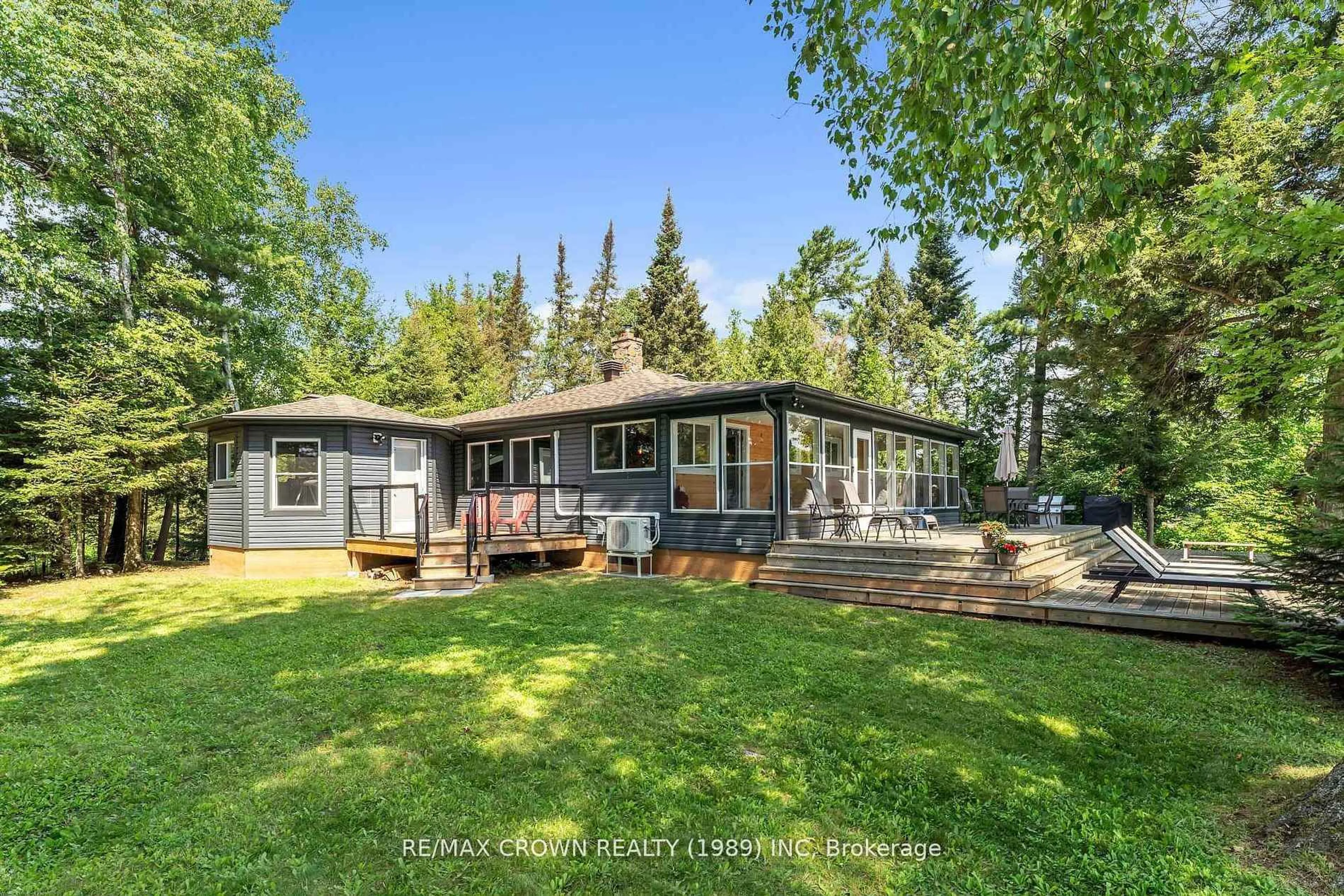 A pic from outside/outdoor area/front of a property/back of a property/a pic from drone, unknown for 71 Northwoods Drive C Island, East Ferris Ontario P0H 1K0