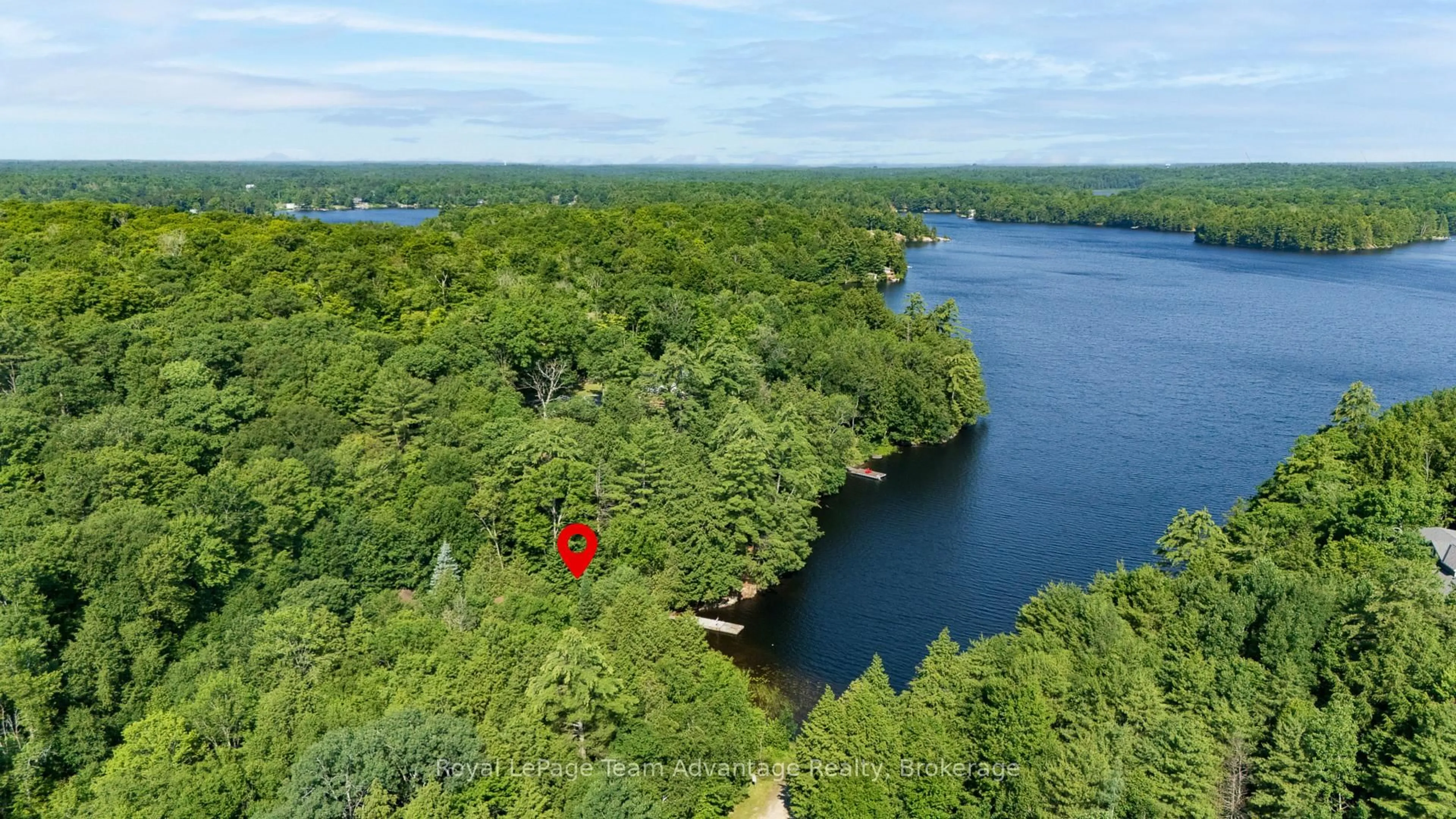 A pic from outside/outdoor area/front of a property/back of a property/a pic from drone, water/lake/river/ocean view for 30 Bartlett Dr, Seguin Ontario P2A 2W8