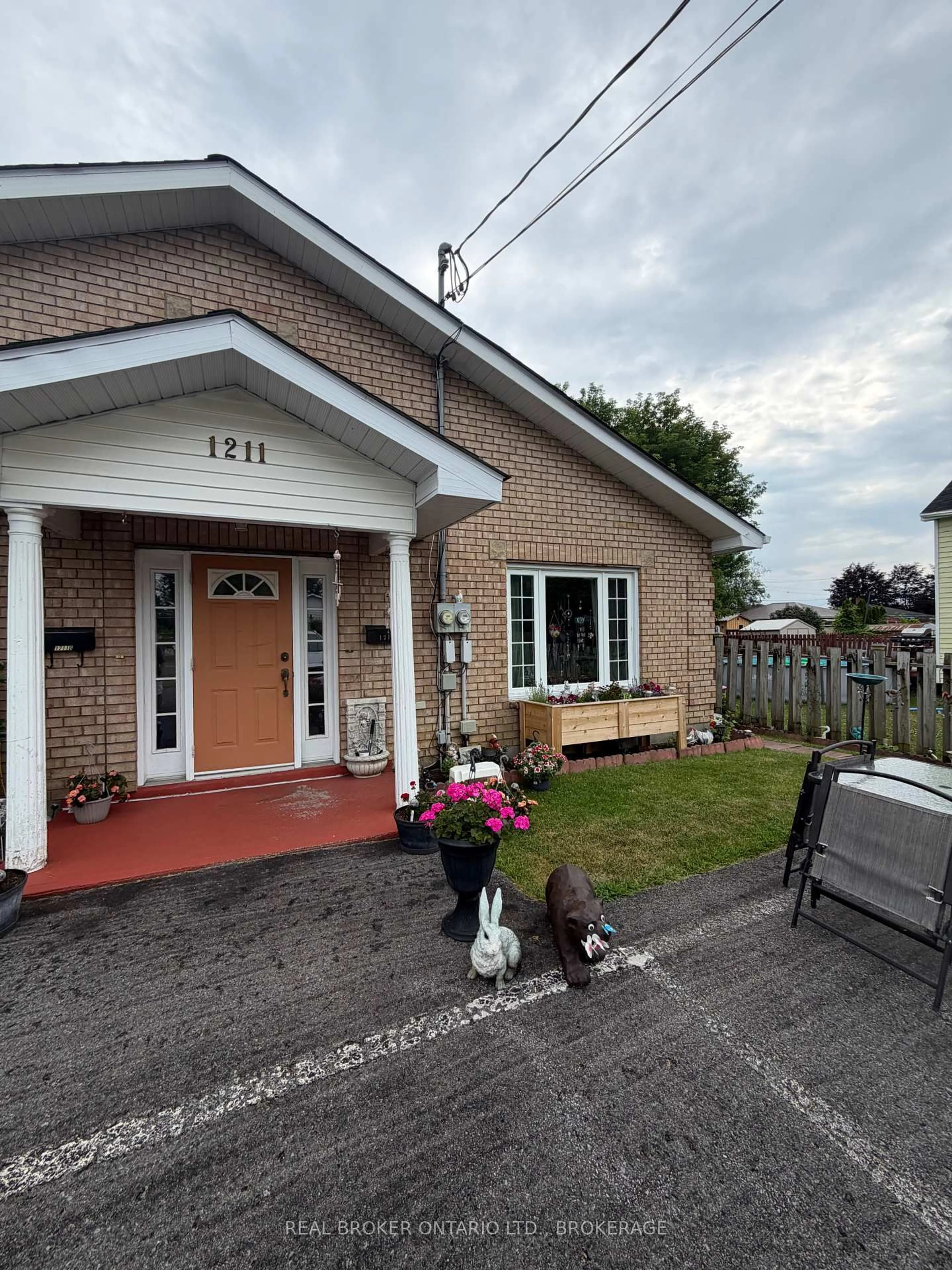 Home with brick exterior material, street for 1211A-1211B Notre Dame St, Cornwall Ontario K6J 4Y7