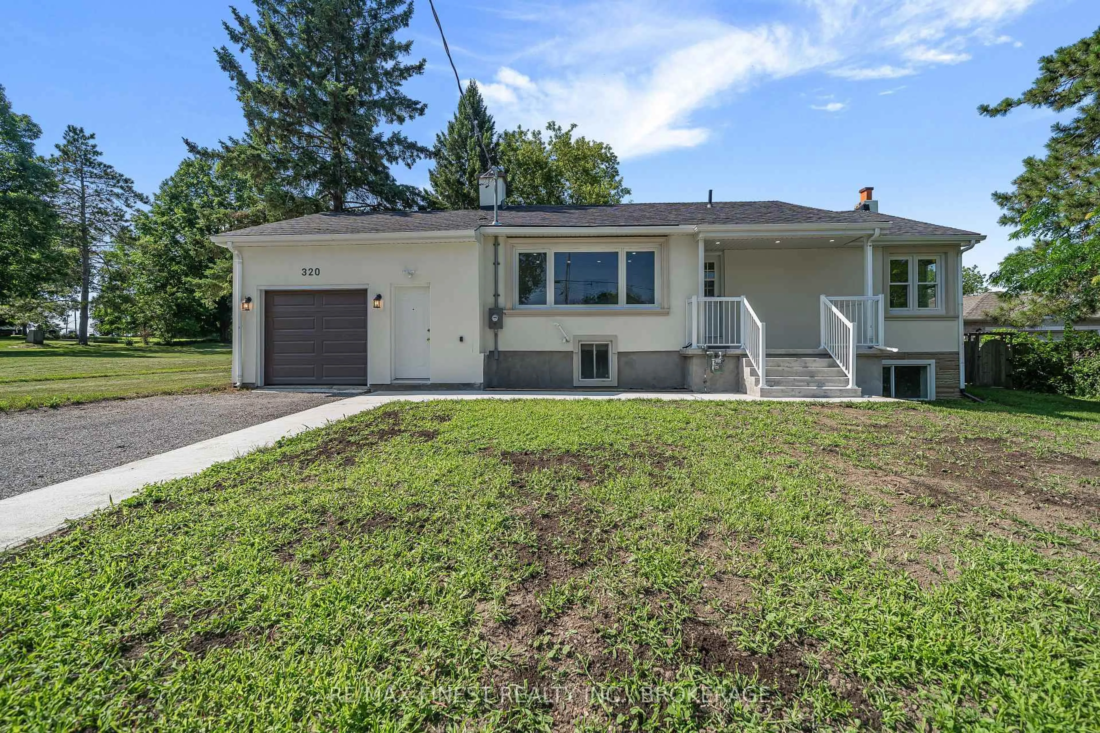 Home with vinyl exterior material, street for 320 Academy St, Bath Ontario K0H 1G0