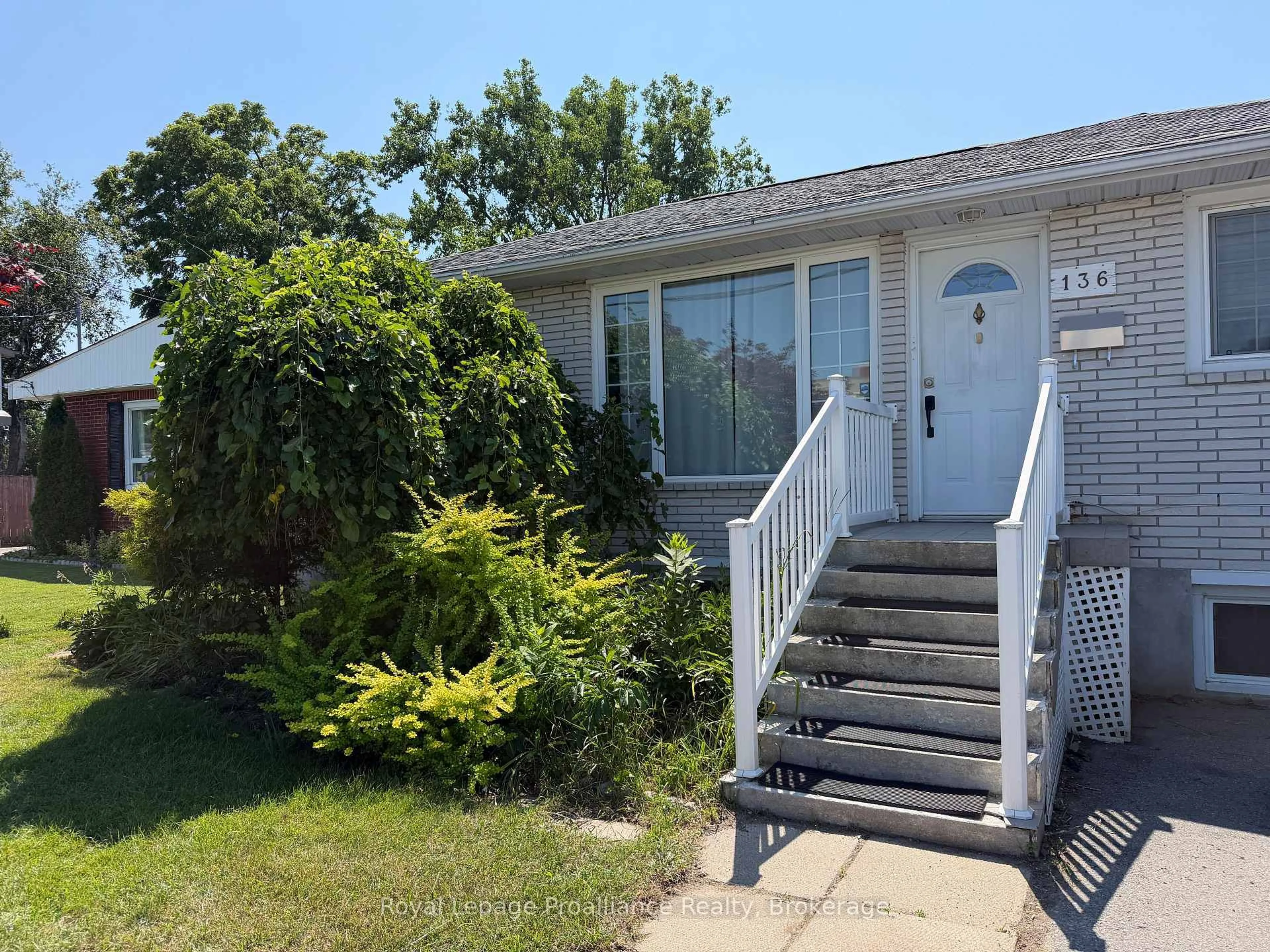 Home with vinyl exterior material, street for 136 Macdonald Ave, Belleville Ontario K8N 3Y3