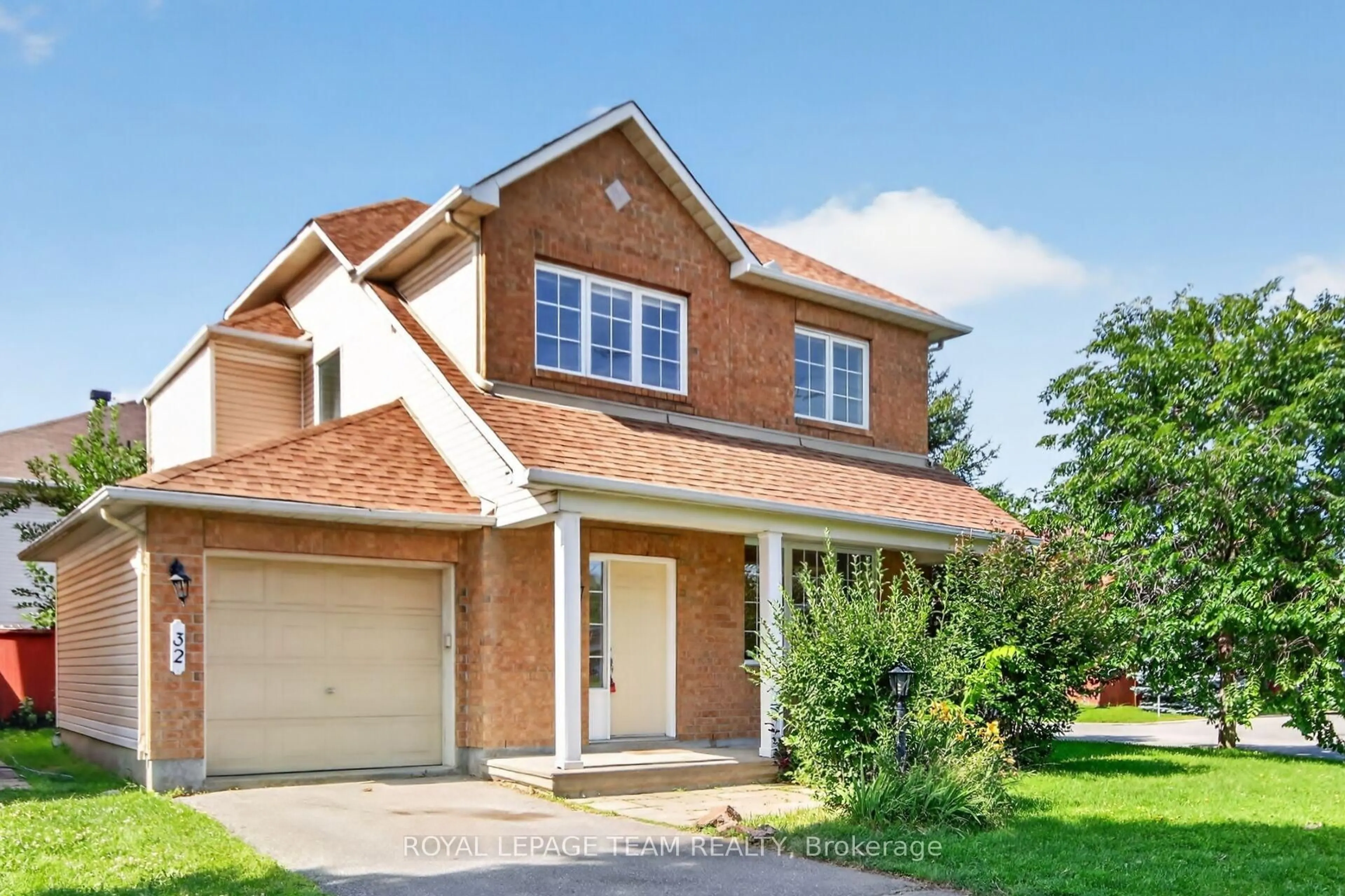 Home with brick exterior material, street for 32 Vistapointe Dr, Barrhaven Ontario K2G 6N3