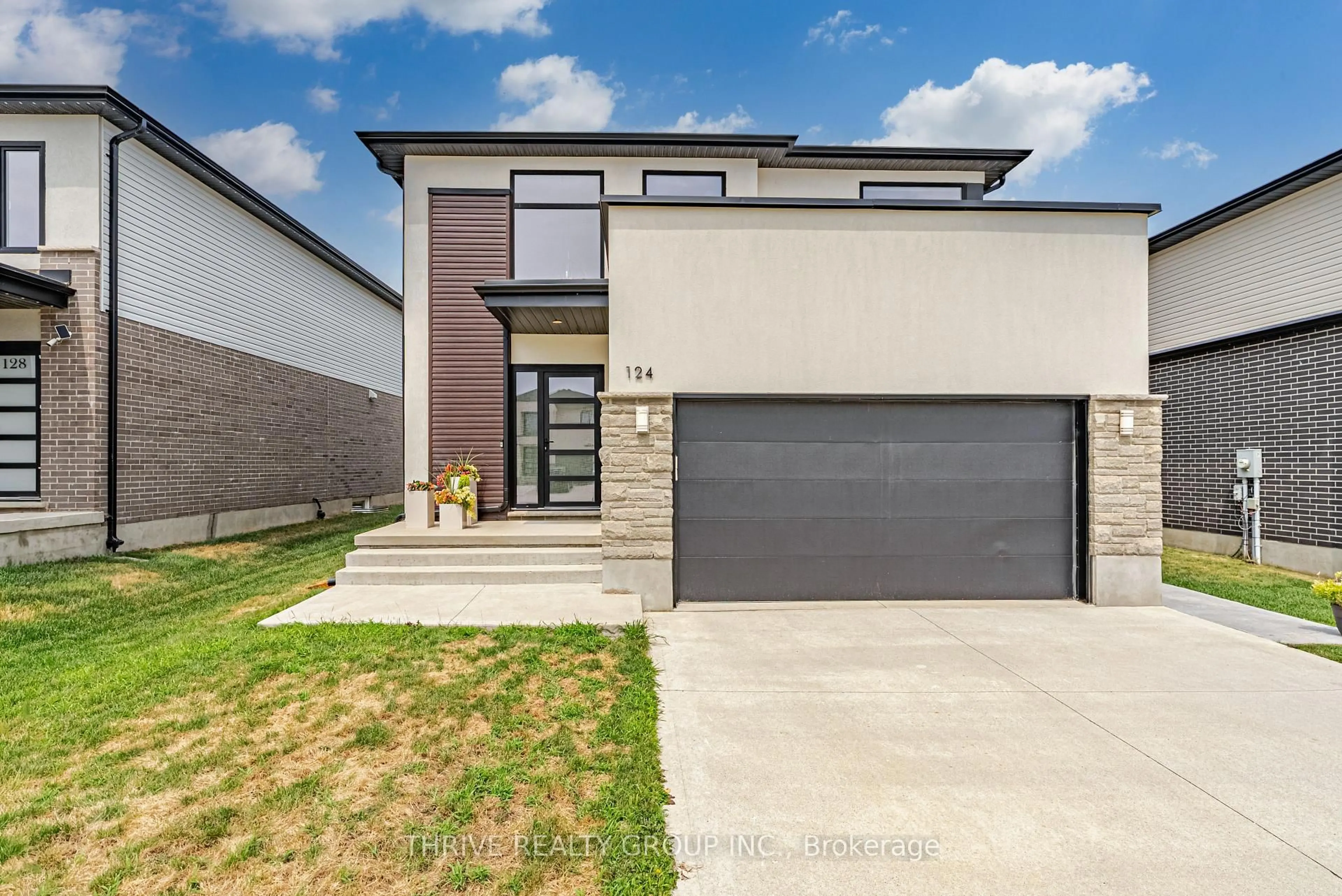 Home with brick exterior material, street for 124 Crestview Dr, Middlesex Centre Ontario N0L 1R0