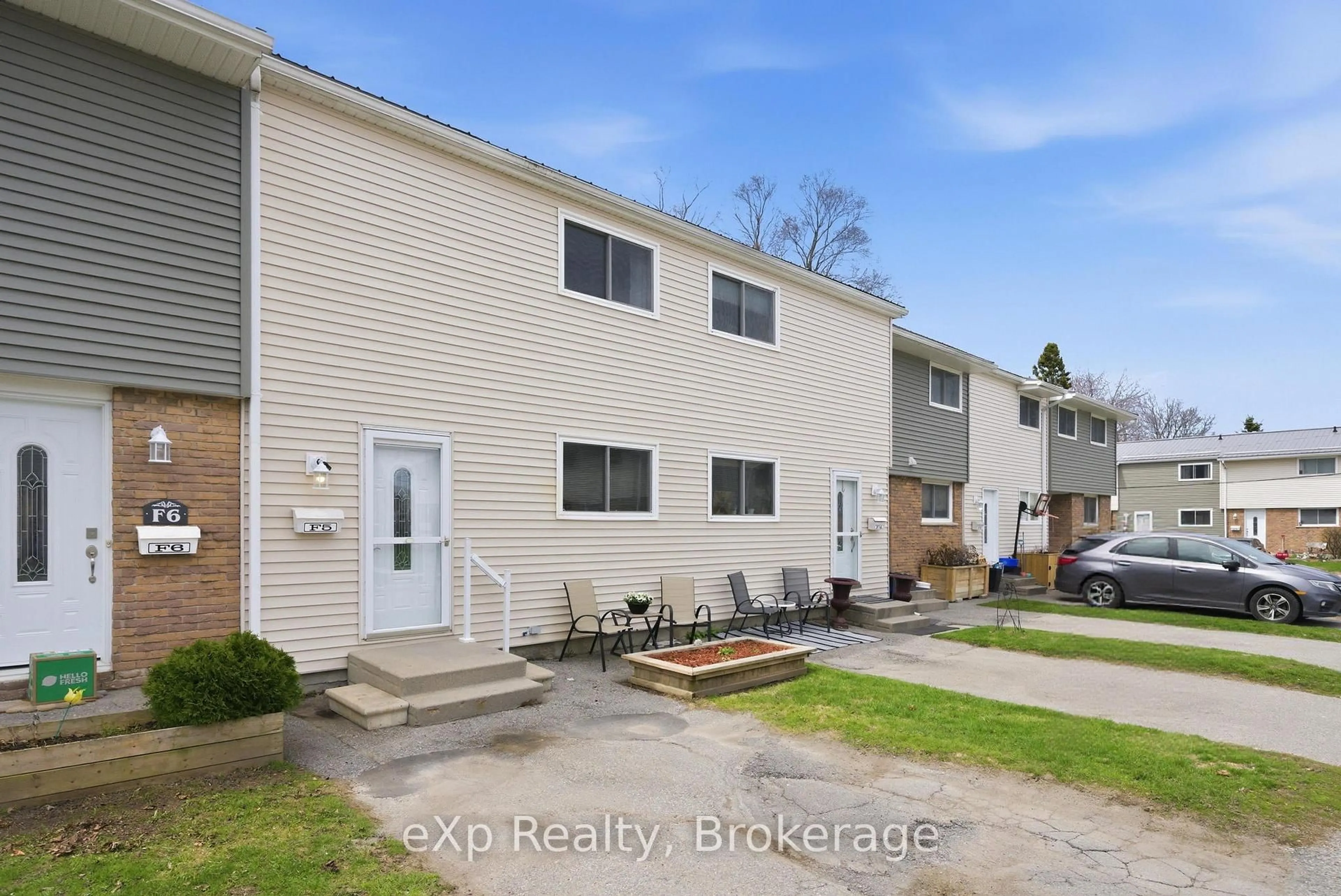 A pic from outside/outdoor area/front of a property/back of a property/a pic from drone, street for 400 Westwood Dr #F5, Cobourg Ontario K9A 2B6