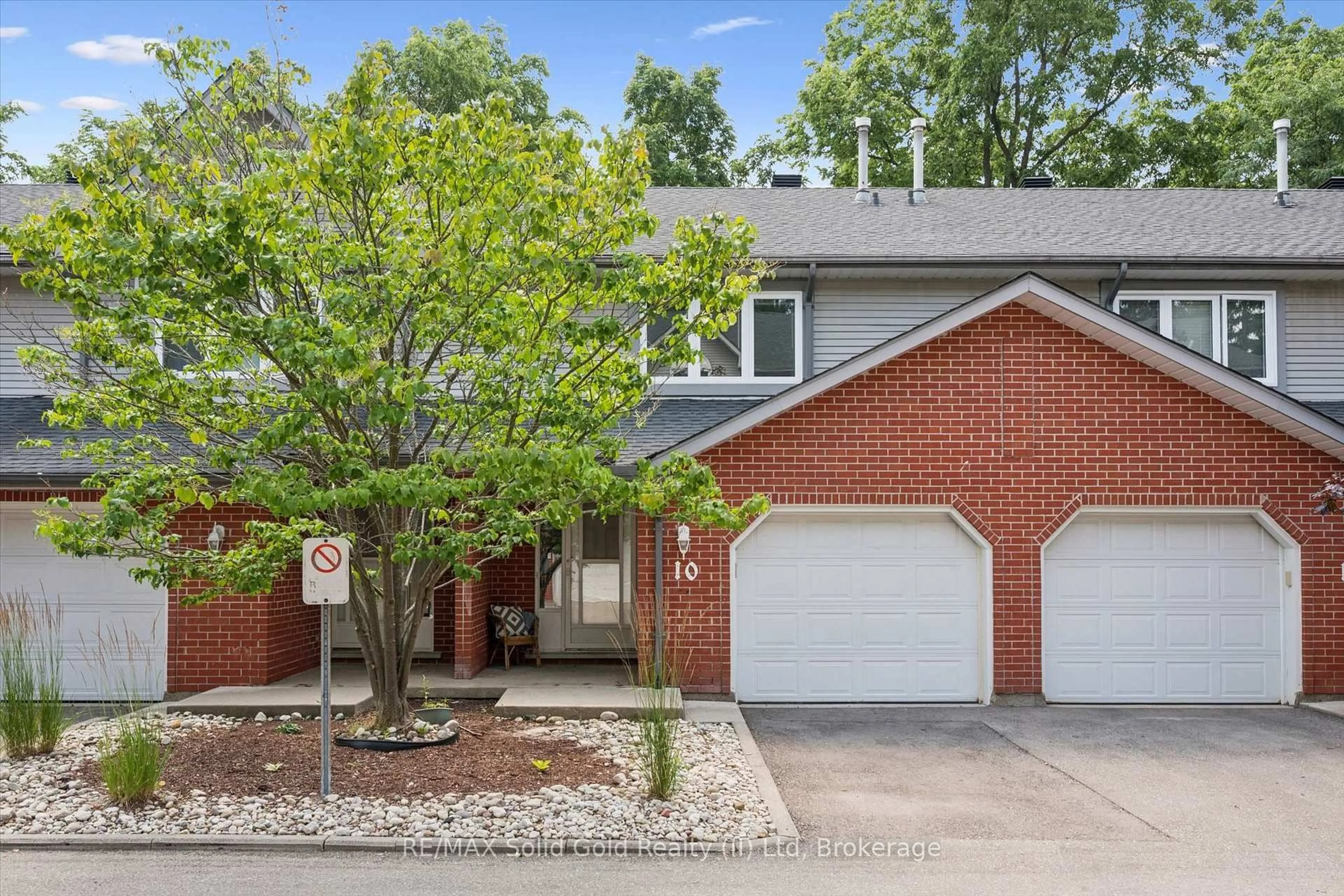 Home with brick exterior material, street for 89 Woolwich St #10, Waterloo Ontario N2K 1S5