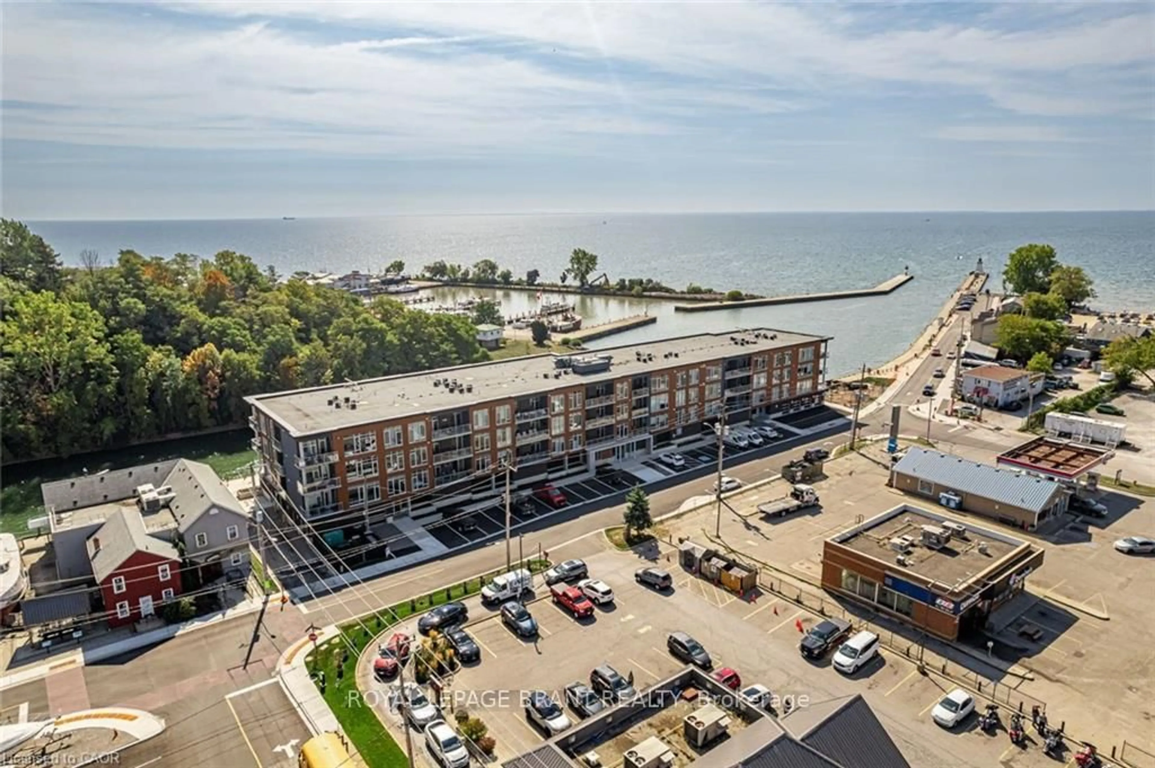A pic from outside/outdoor area/front of a property/back of a property/a pic from drone, water/lake/river/ocean view for 38 Harbour St #306, Norfolk Ontario N0A 1N0