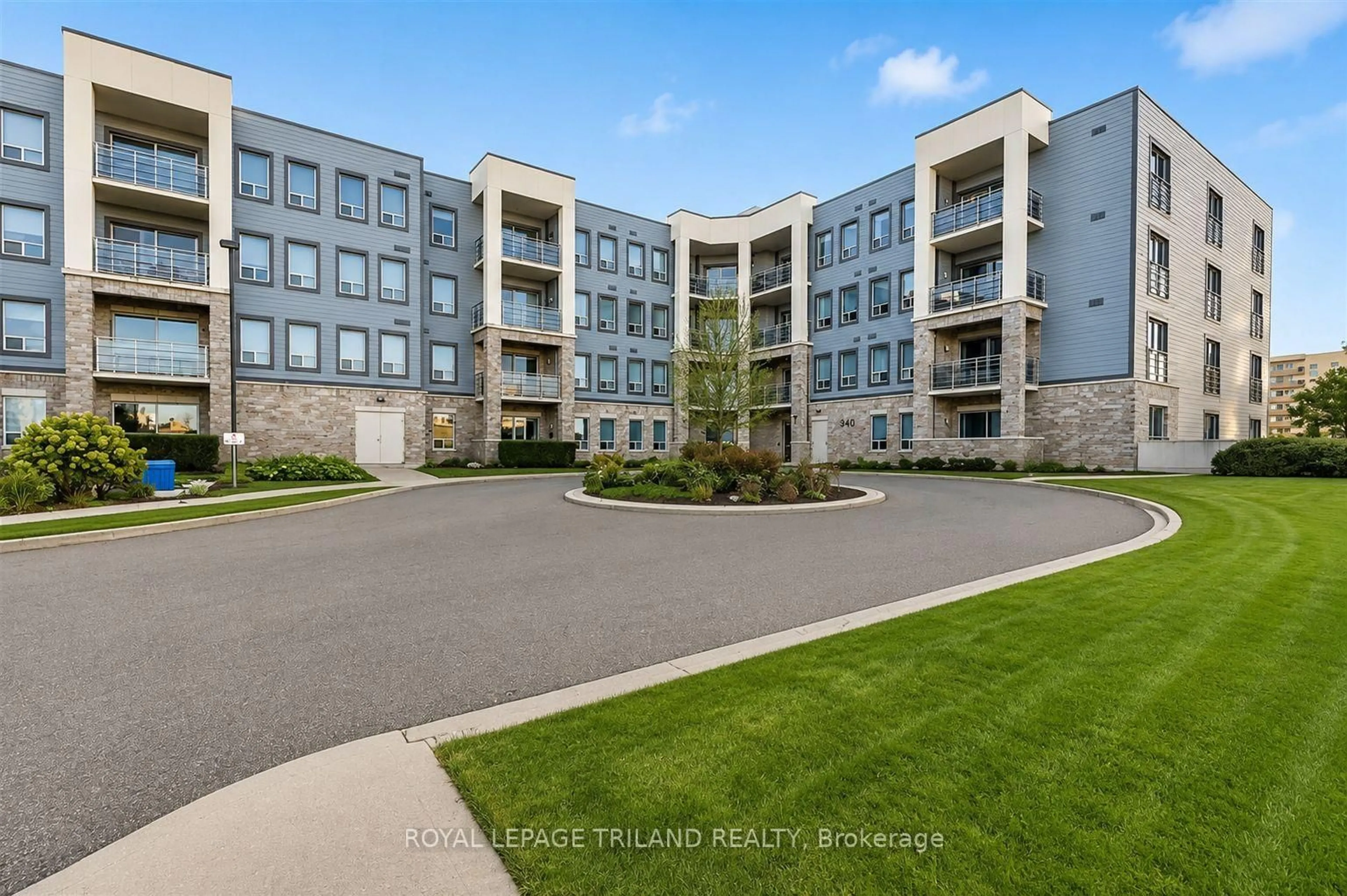A pic from outside/outdoor area/front of a property/back of a property/a pic from drone, building for 340 Sugarcreek Tr #510, London North Ontario N6H 0G4