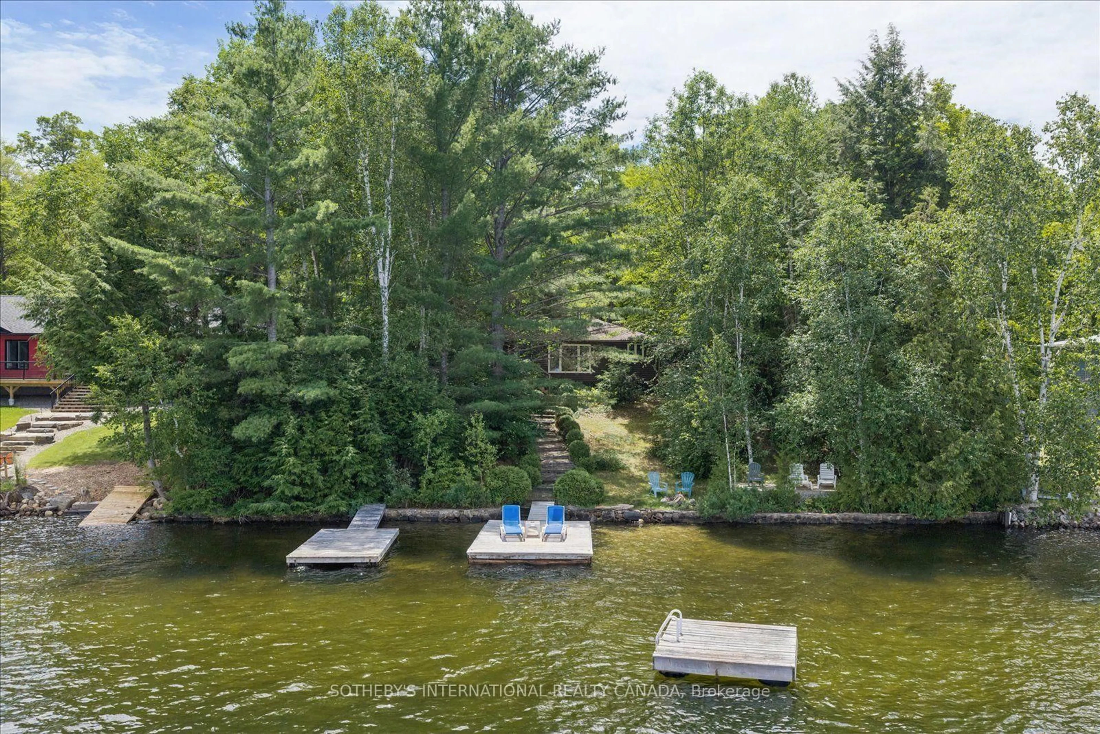 A pic from outside/outdoor area/front of a property/back of a property/a pic from drone, water/lake/river/ocean view for 1003 Gentle Breeze Lane, Dysart et al Ontario K0M 1S0