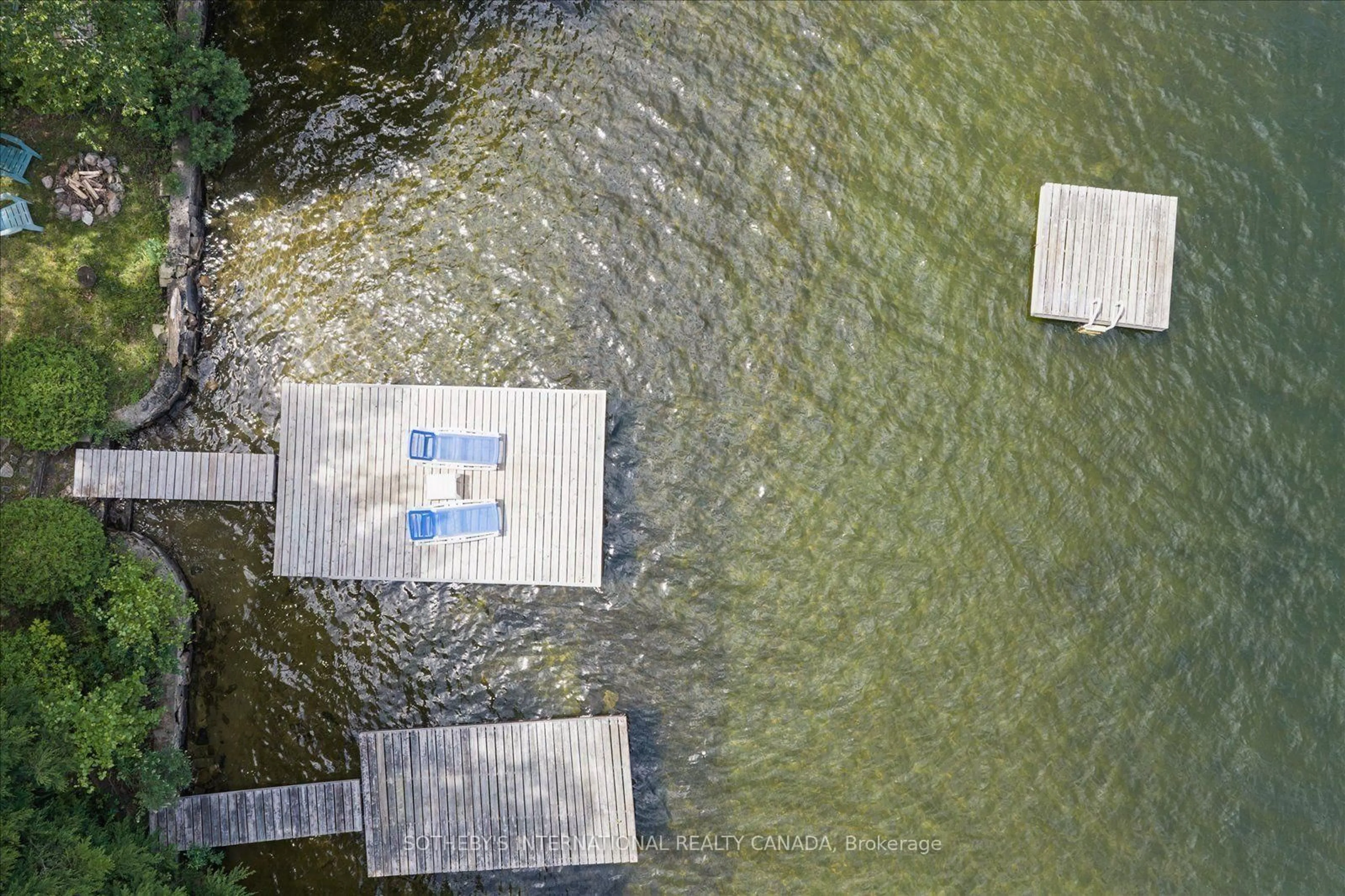 A pic from outside/outdoor area/front of a property/back of a property/a pic from drone, water/lake/river/ocean view for 1003 Gentle Breeze Lane, Dysart et al Ontario K0M 1S0