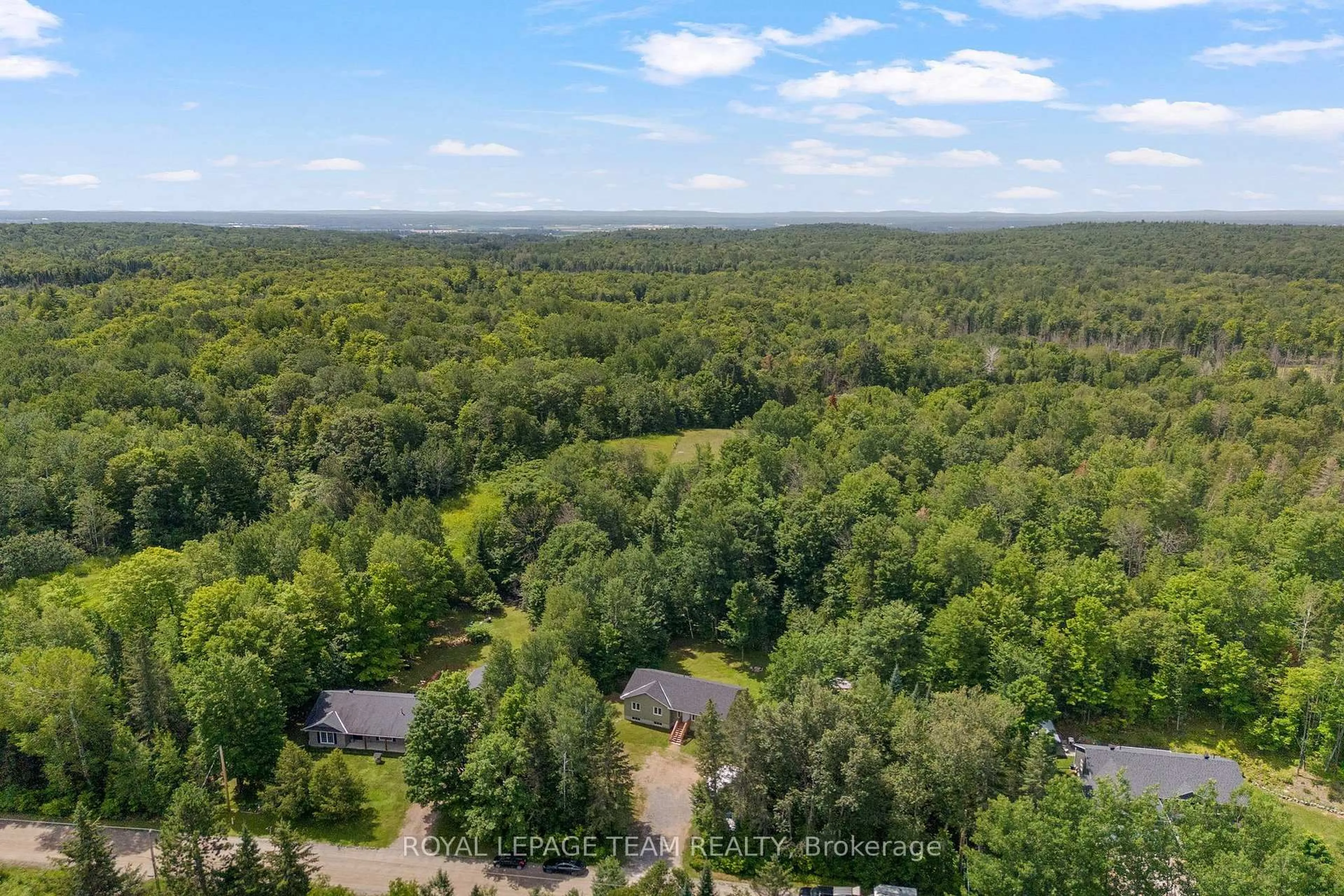 A pic from outside/outdoor area/front of a property/back of a property/a pic from drone, forest/trees view for 405 Calvin Rd, Haley Station Ontario K0J 1Y0