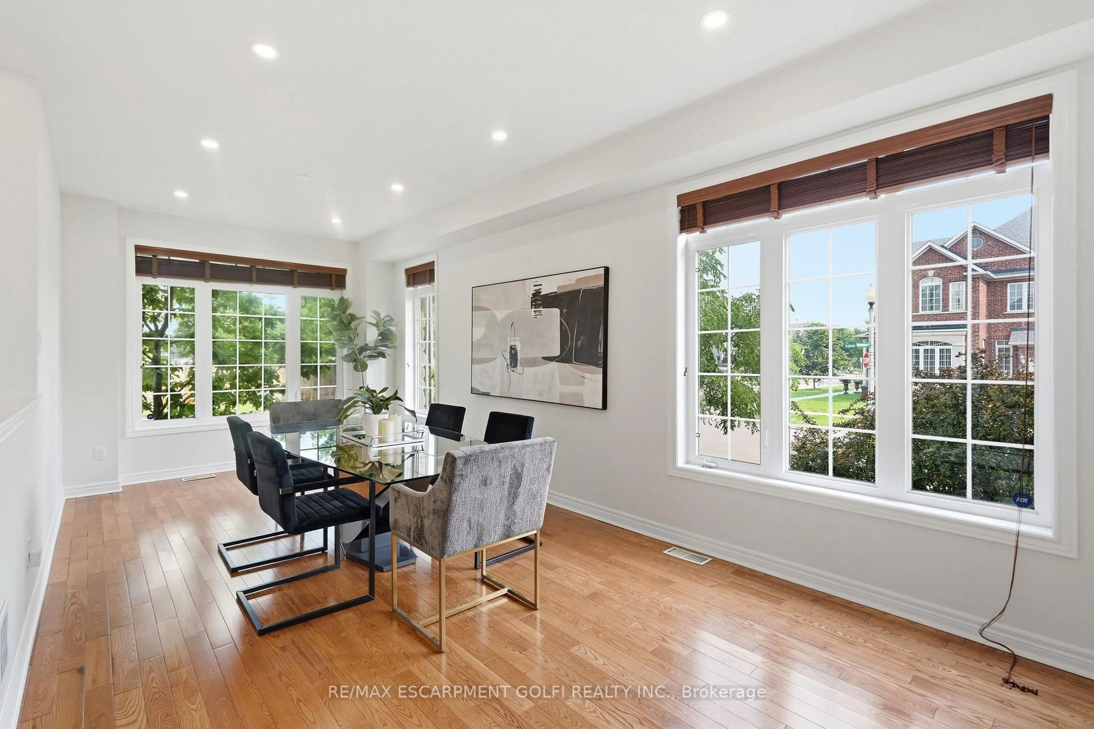 Dining room, wood/laminate floor for 100 Springstead Ave, Hamilton Ontario L8E 6E9